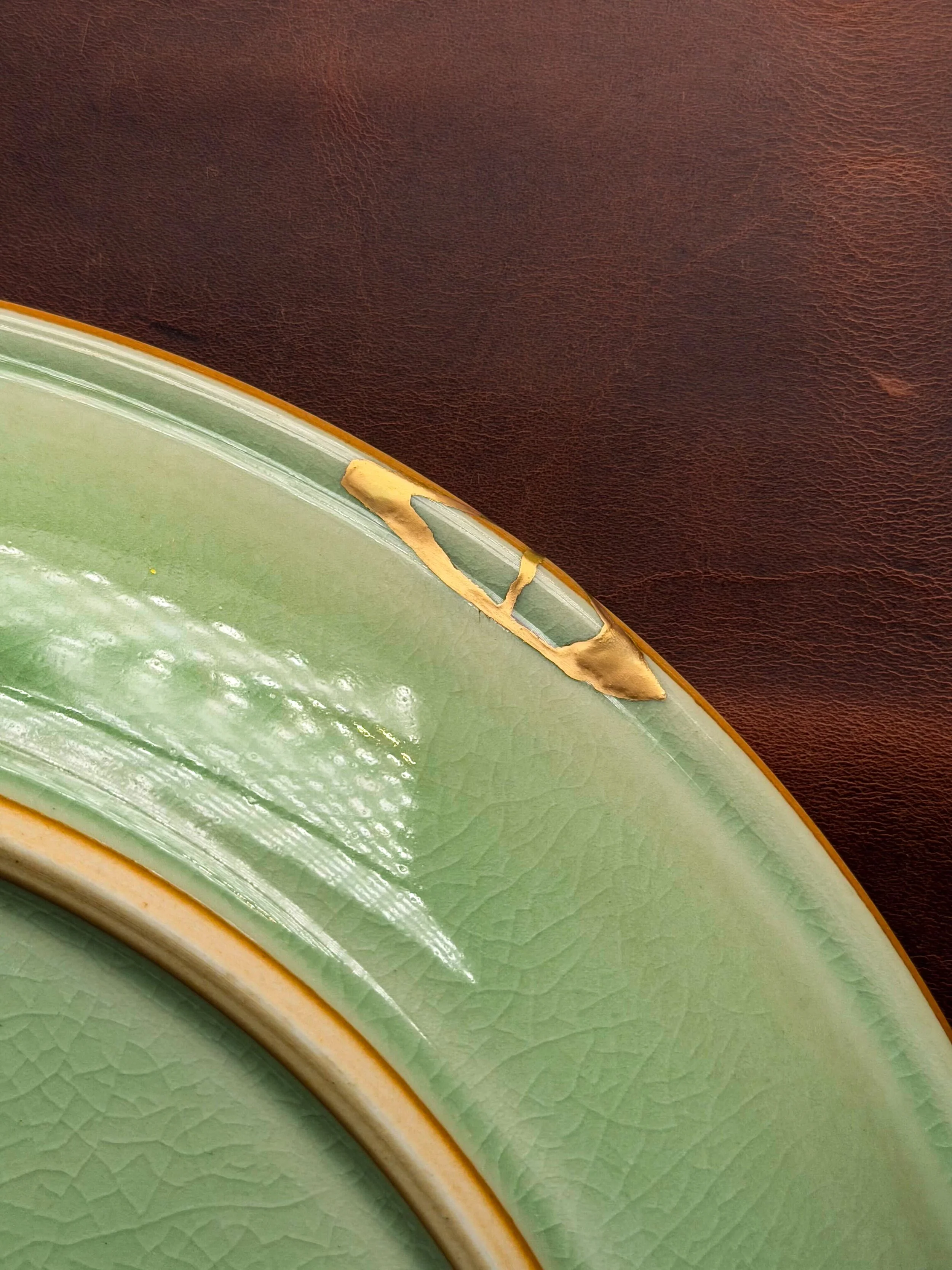 This enormous platter was purchased during its owners’ honeymoon in Thailand 30 years ago. The damage was relatively small, and from the front the repair is barely visible. What I love is that it reveals itself through touch instead: when you hold th