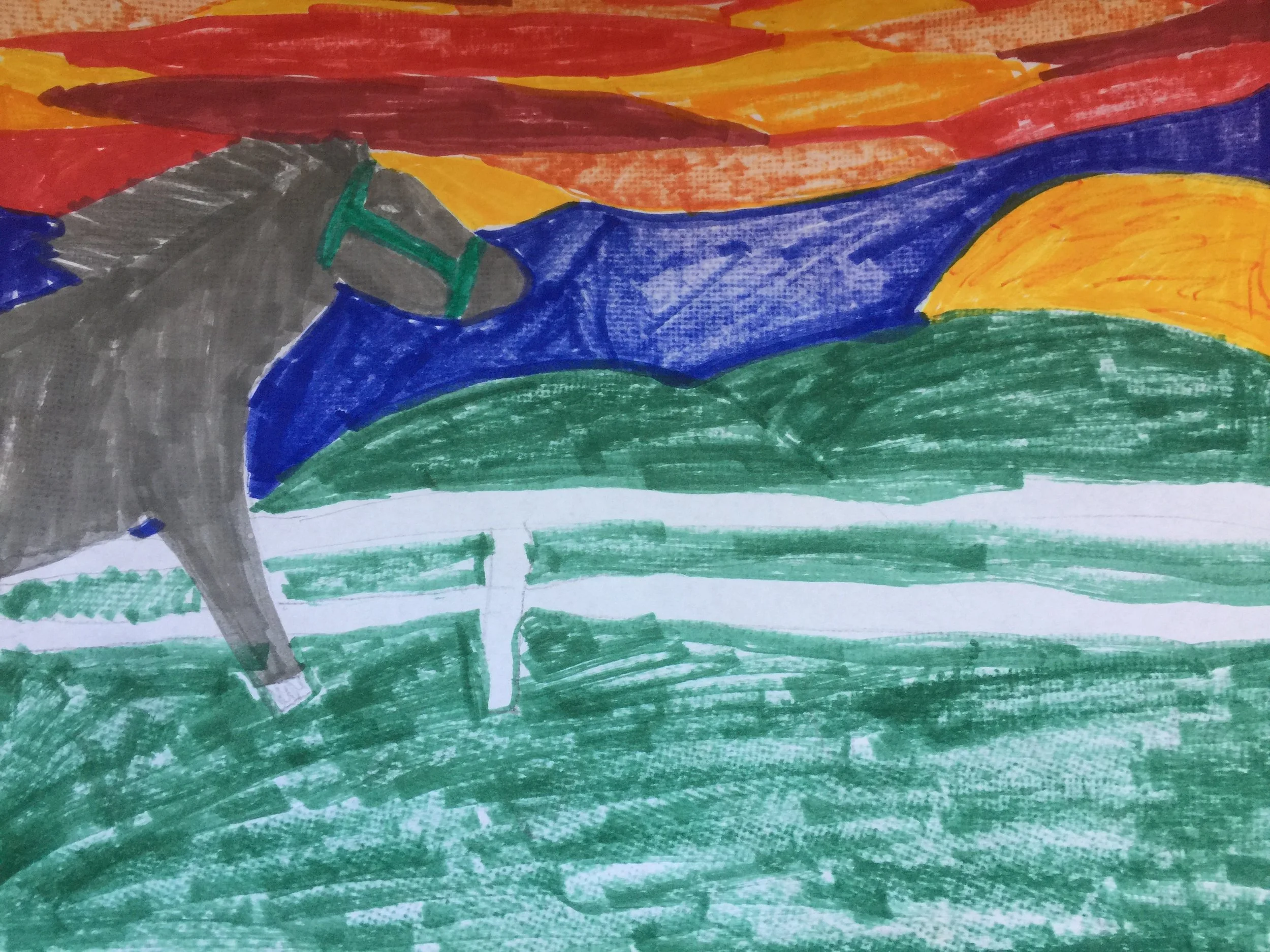 A childlike drawing of a gray horse with a green bridle standing on green grass, with a backdrop of a yellow and orange sunset sky and blue mountains.