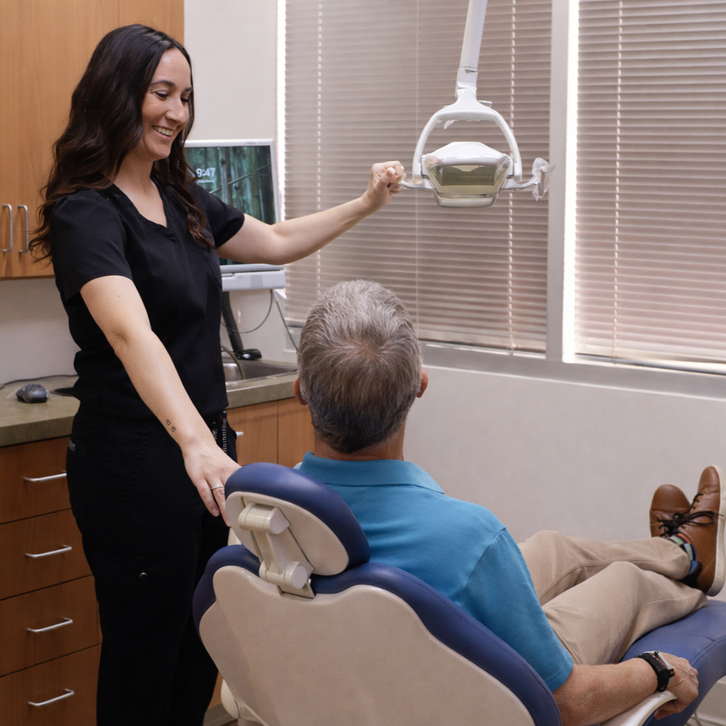 Phoenix dental hygienist delivering gentle, preventative care during a routine dental cleaning