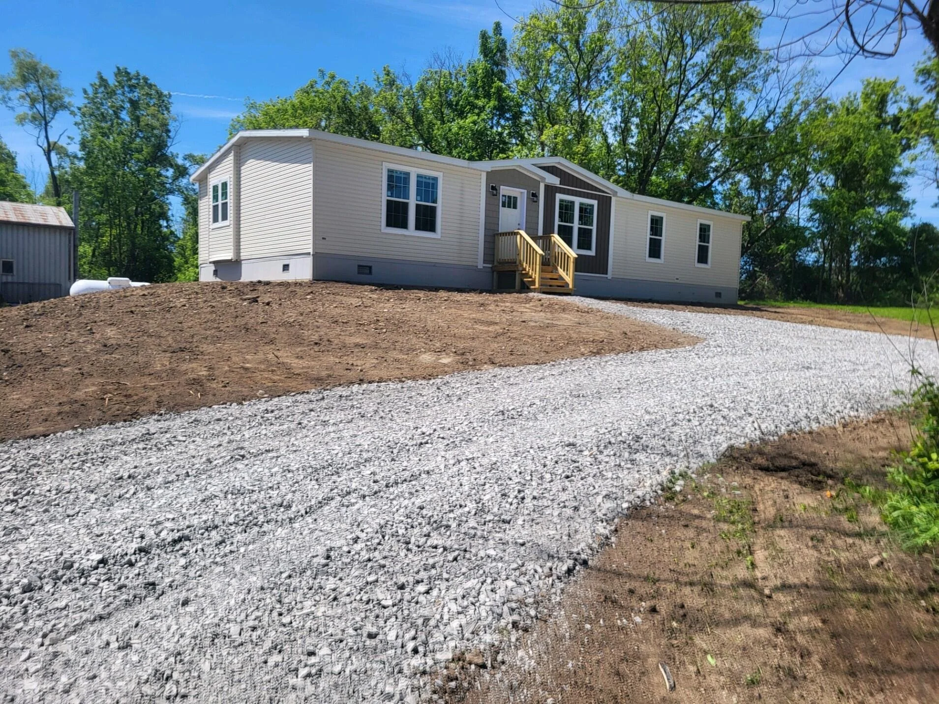 Manufactured home with insulated skirting.jpg