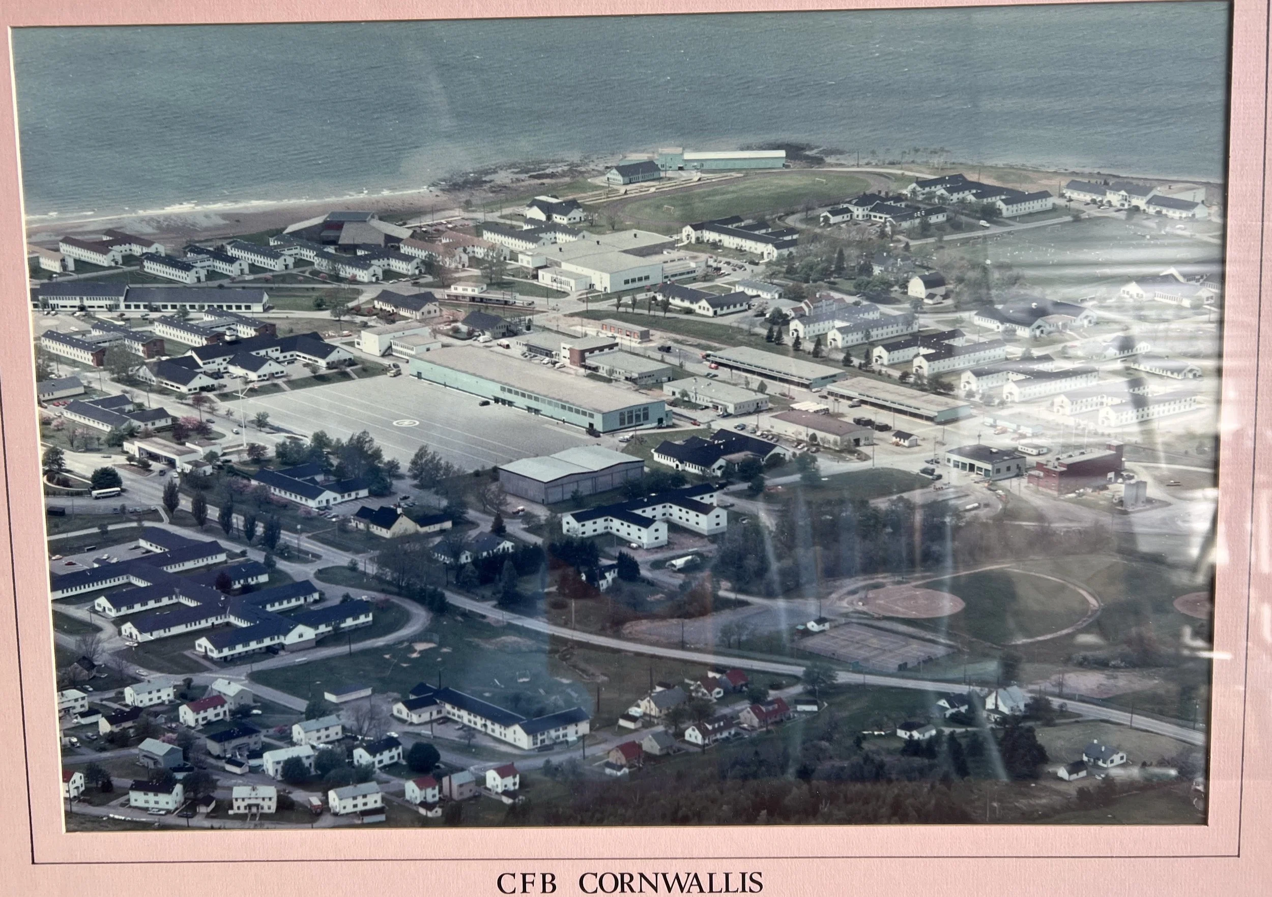 Aerial photograph of the former Canadian Forces Base (CFB) Cornwallis located in Deep Brook, Nova Scotia.  During its operation, it served as a primary training facility for the Royal Canadian Navy and later the unified Canadian Forces. Commissioned 
