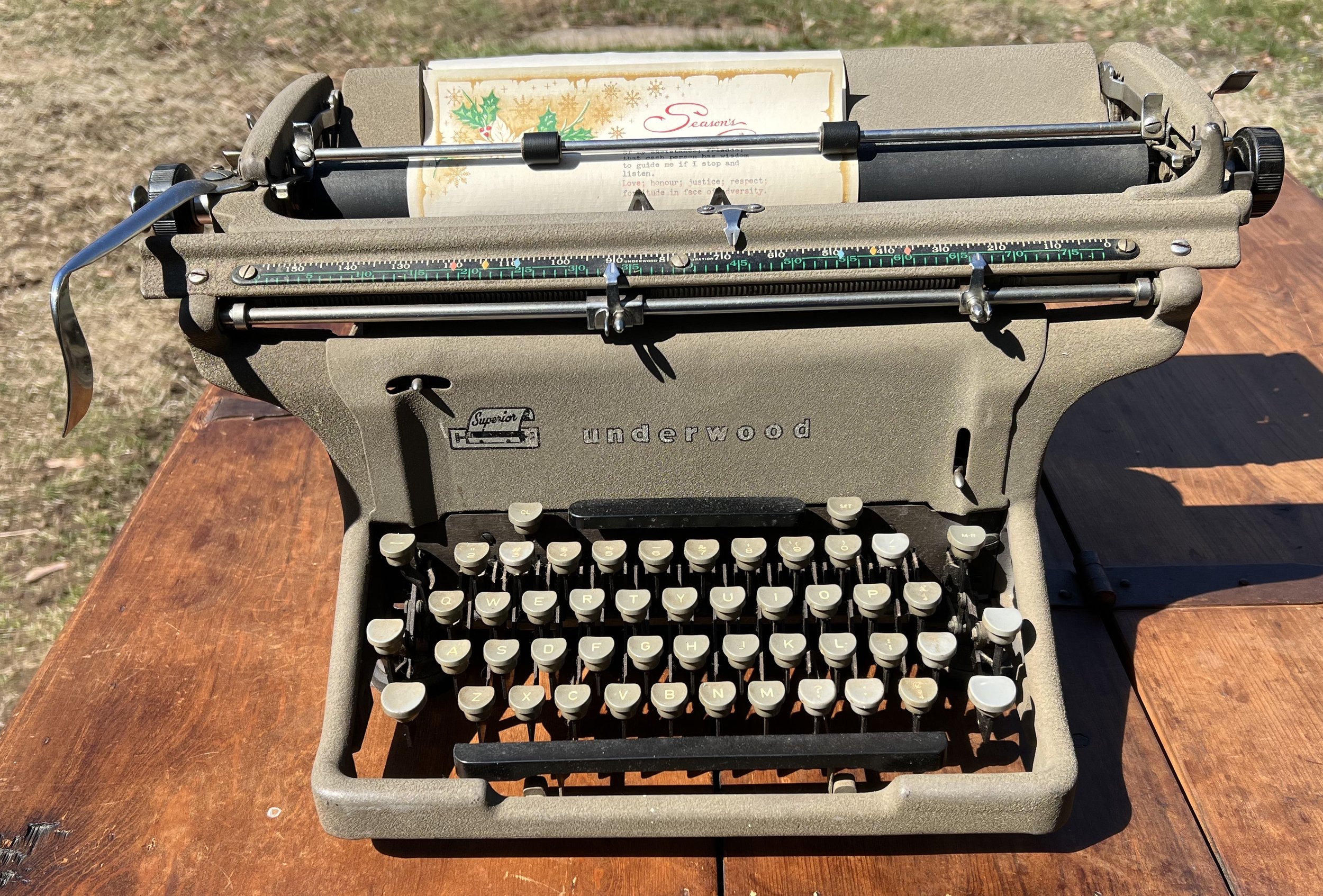 
This typewriter is a vintage Underwood Rhythm Touch (also referred to as the Underwood SS), a standard desktop manual model manufactured by the Underwood Corporation. 
Based on the design and visual characteristics, such as the grey crinkle-finish b
