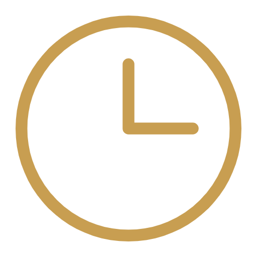 Gold clock showing the time as 3:00.