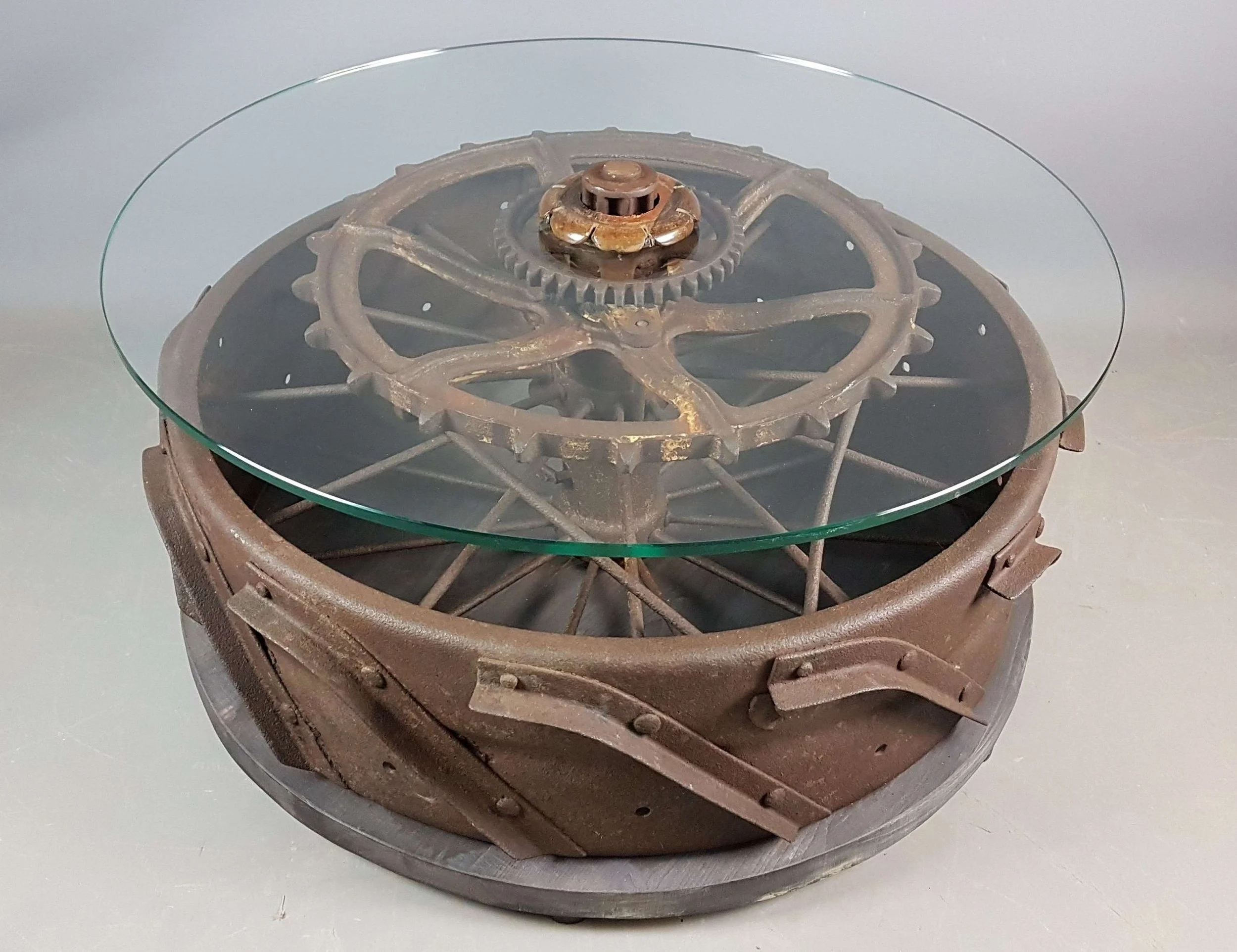 antique-iron-tractor-wheel-coffee-table_10075_main_size3.jpg