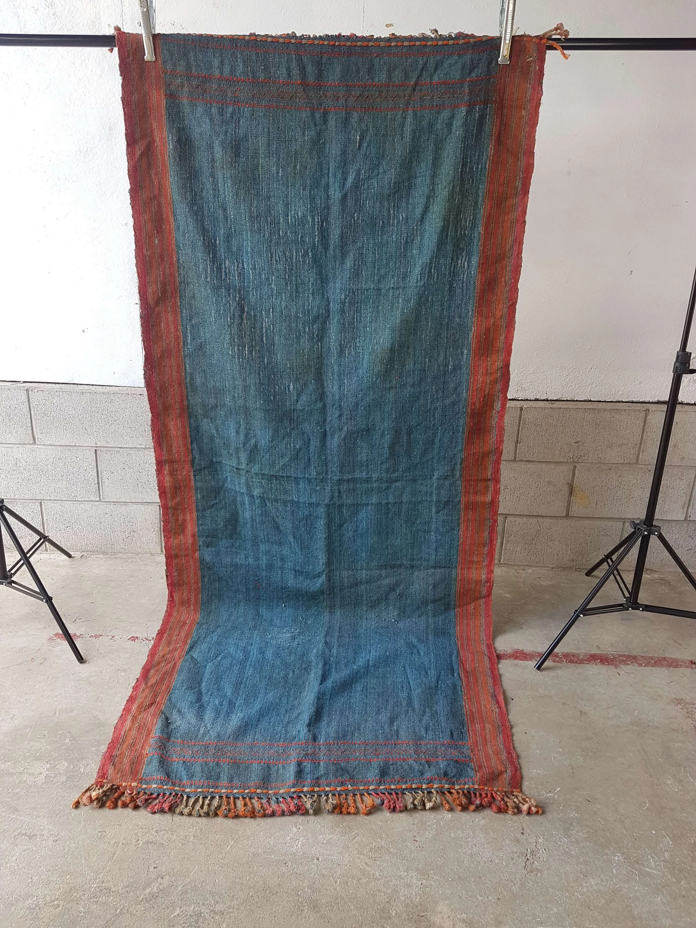 antique-hand-woven-knotted-indigo-blue-rug-with-ground-red-surround_10164_main_size3.jpg