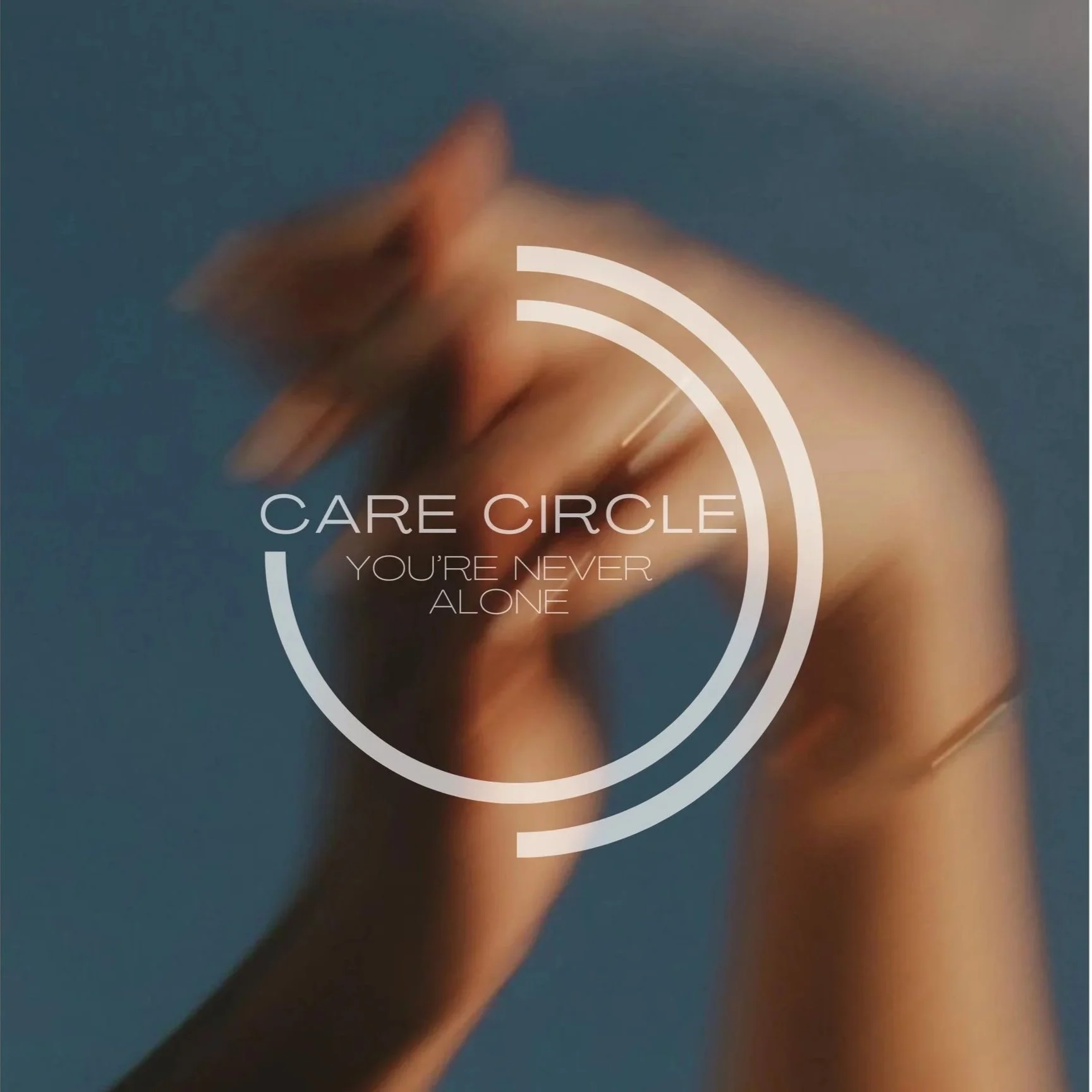 Blurred image of a person's hand with rings, holding a stylus or pen against a blue background, overlaid with text that reads 'Care Circle, You're Never Alone.'