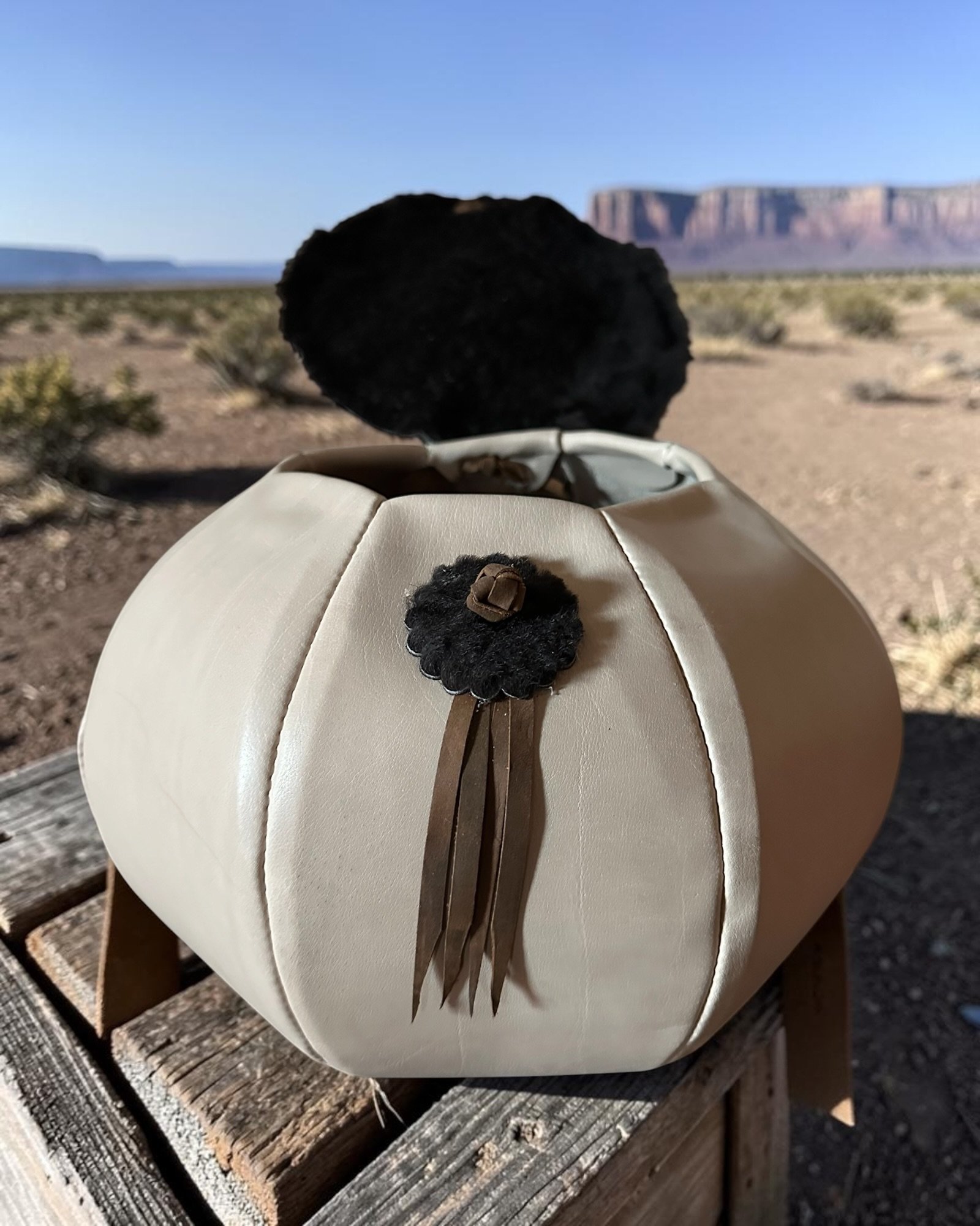 Buffalo Bill open lid rustic Texas landscape.jpeg