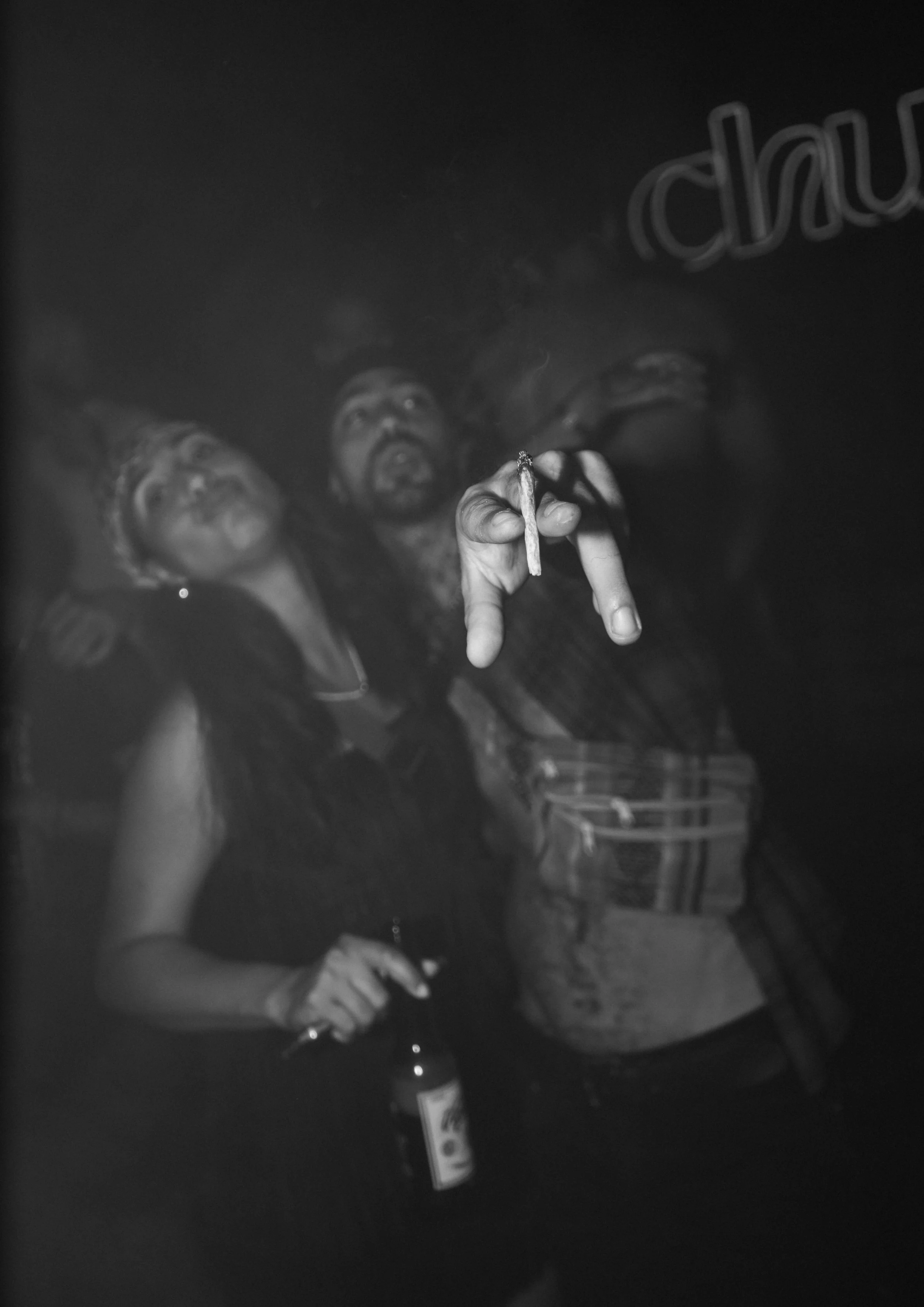 Group of young adults socialising at a nightlife venue in Noosa, drinks and low light setting, Sunshine Coast event and nightlife photography