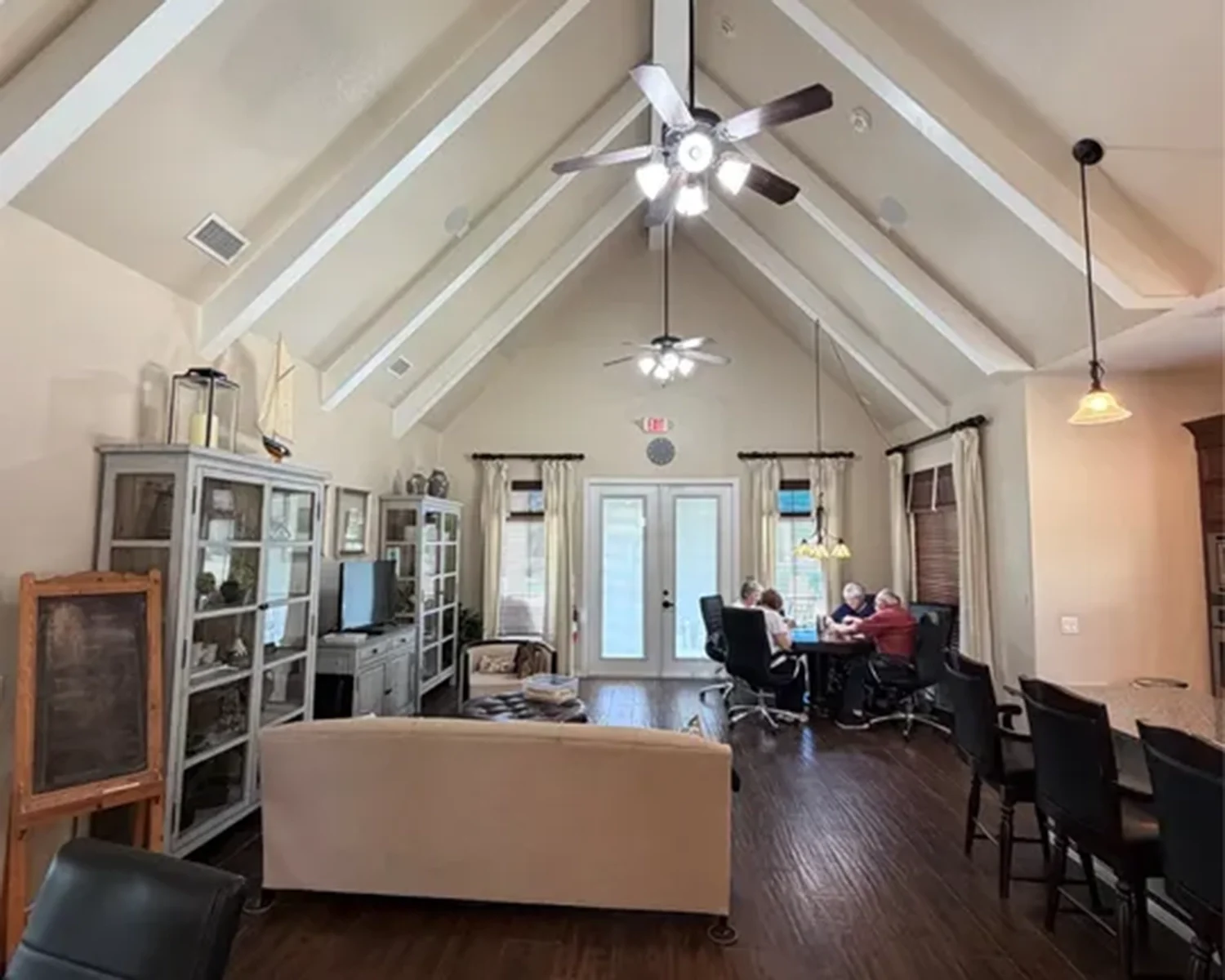 clubhouse-main-room-people-playing-card-game