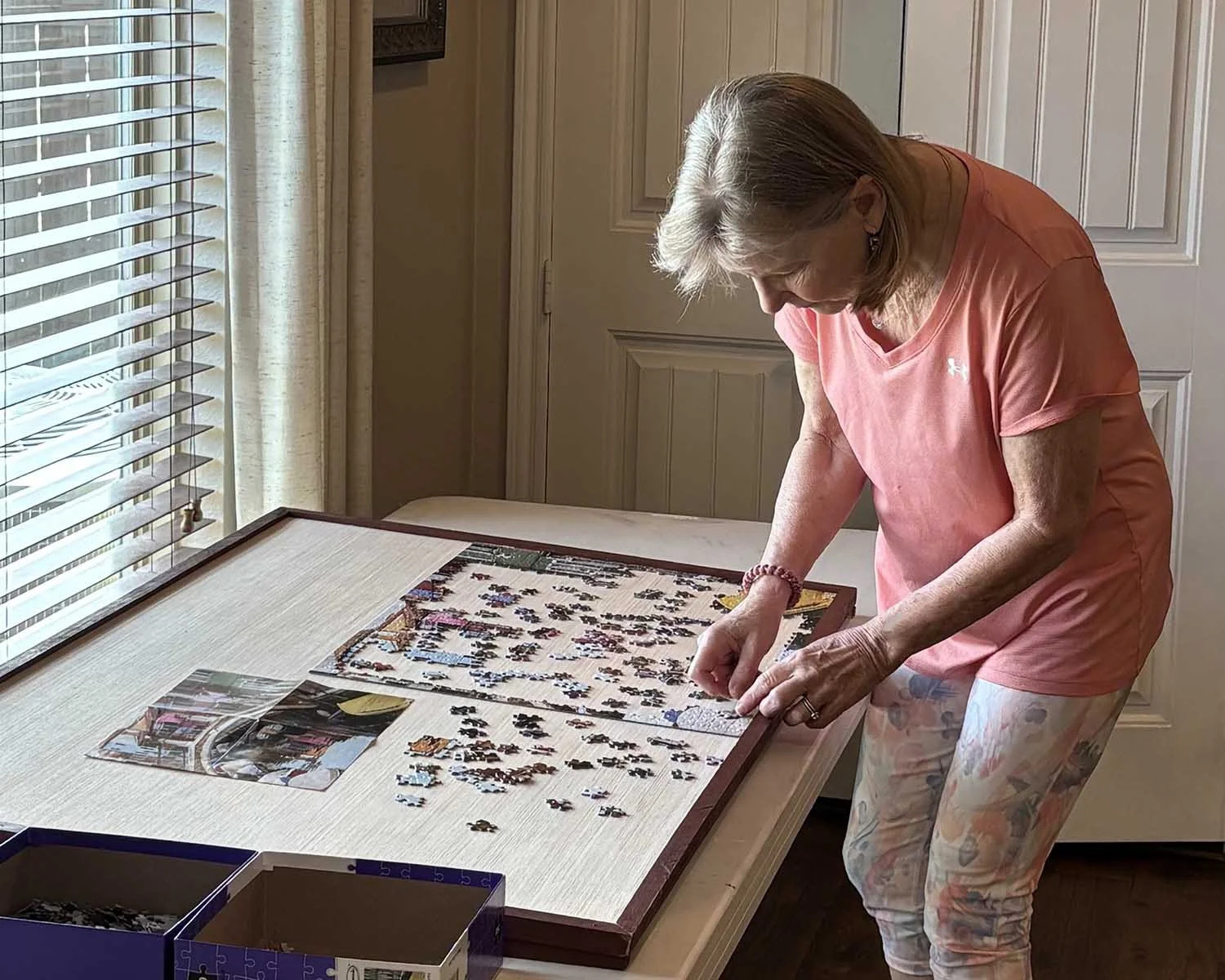 woman-at-jigsaw-puzzle-table
