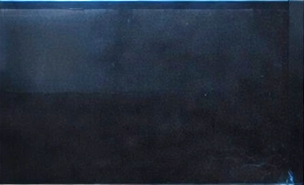 A dark, shadowed scene with no distinct objects or details visible.