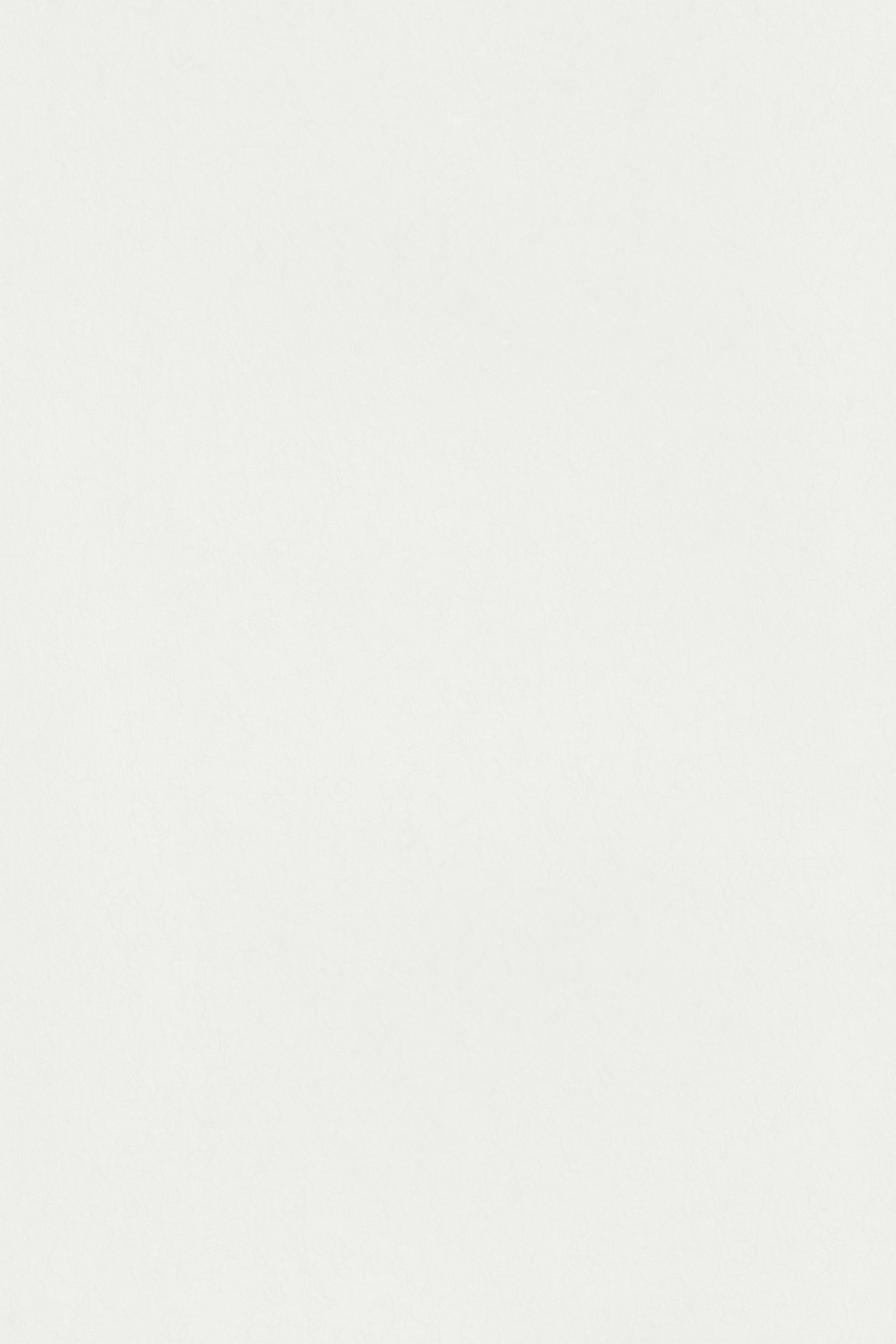 Blurred, light-colored textured background with no distinguishable objects.
