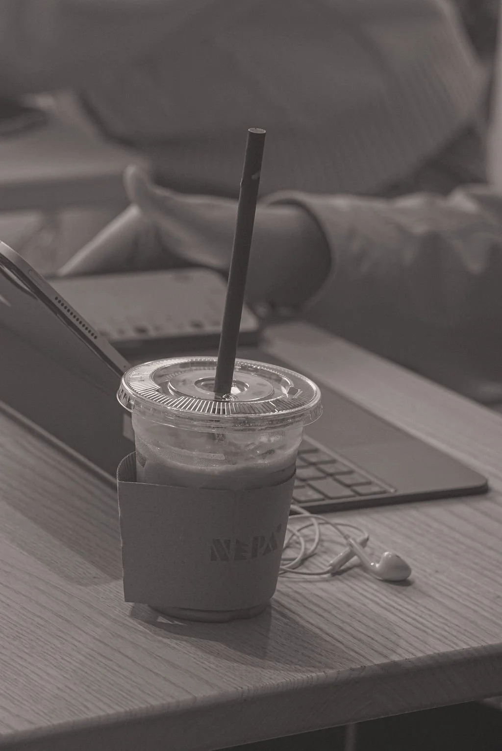 COFFEE AND LAPTOP AT A TABLE