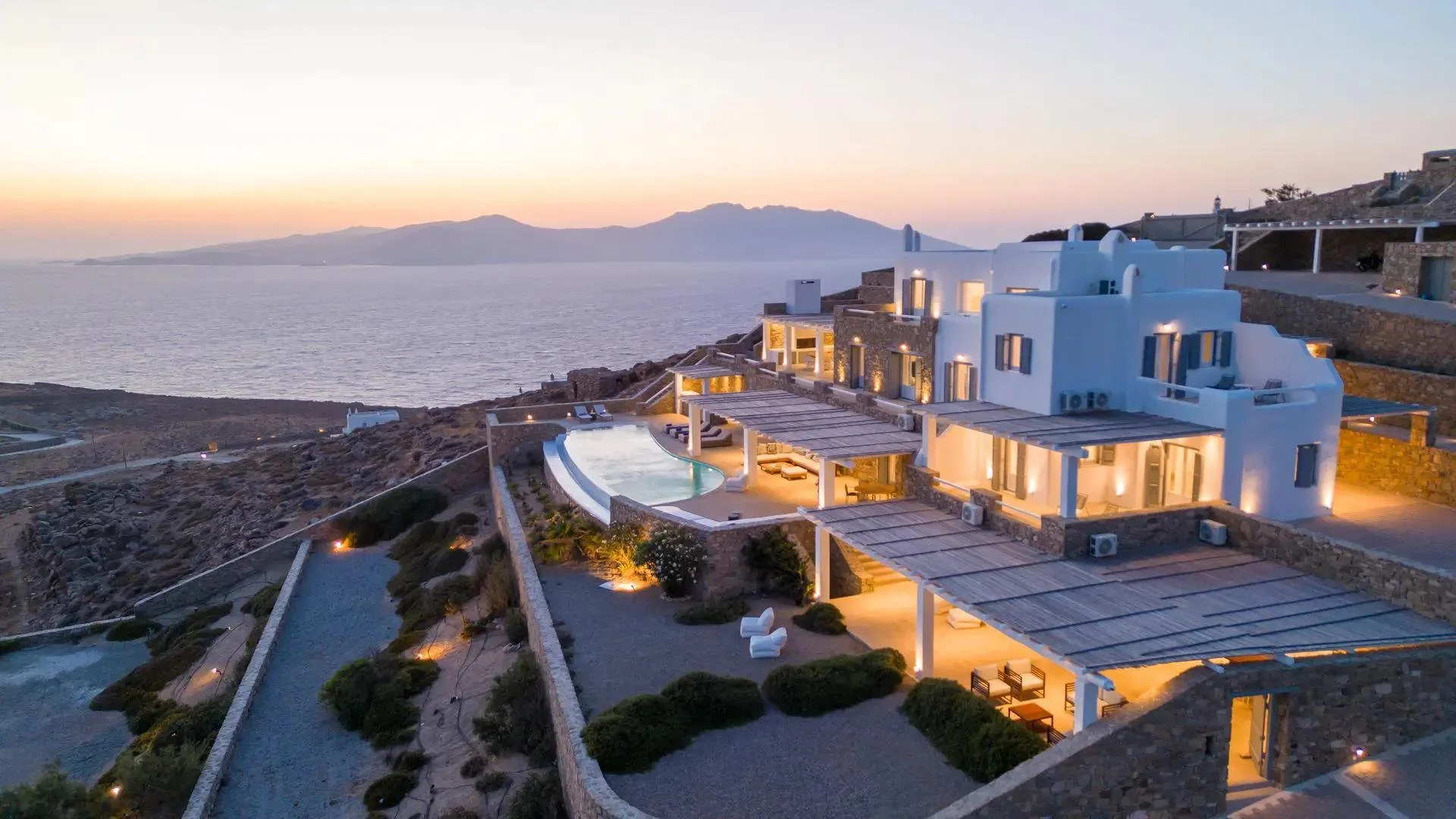 Contemporary Cycladic villa in Mykonos with an infinity pool and panoramic views across the Aegean Sea.
