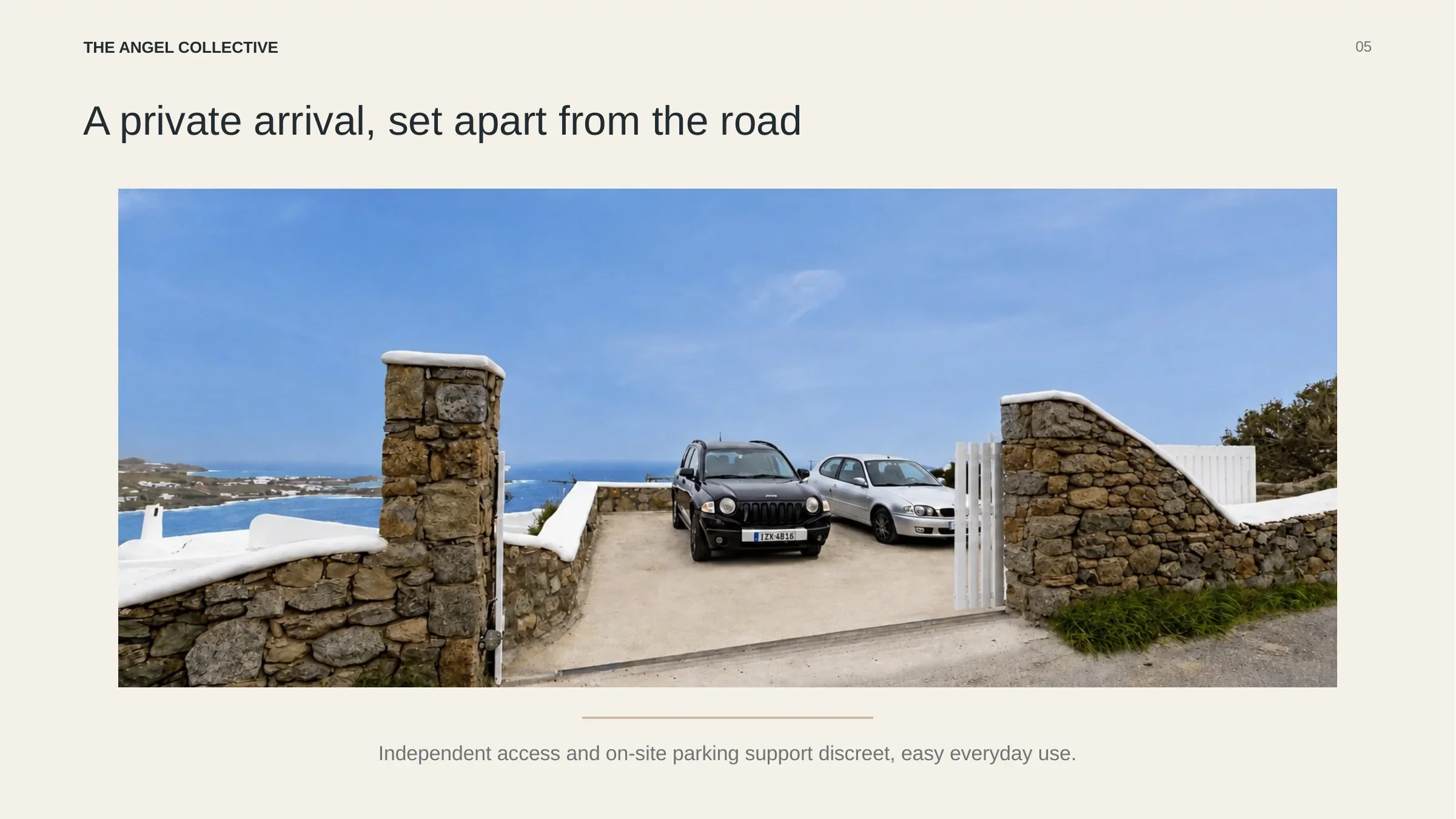 Private stone-walled entrance and on-site parking for three vehicles at a residence above Psarou.