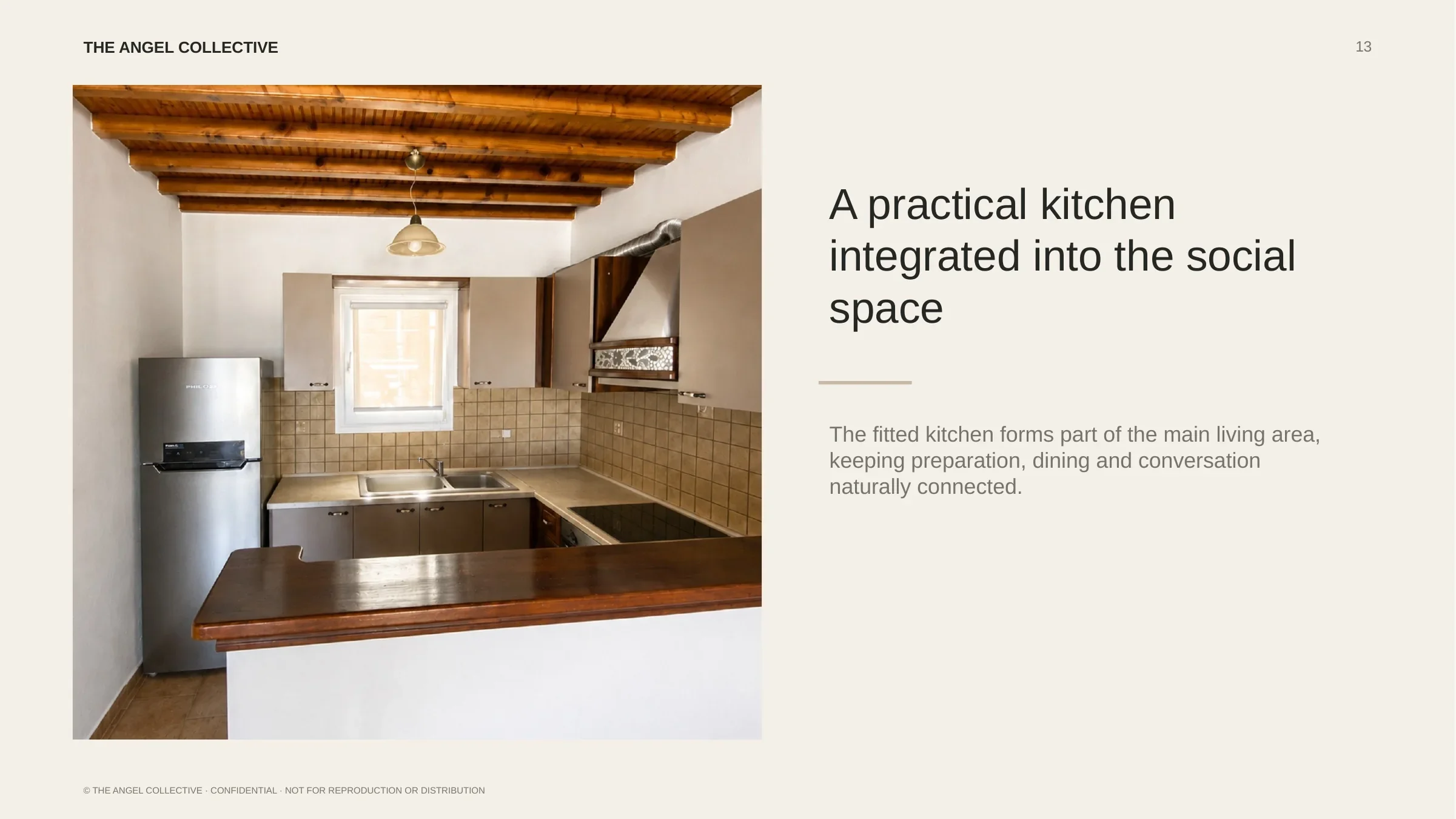 Practical fitted kitchen integrated into the main social space of the single-level residence.