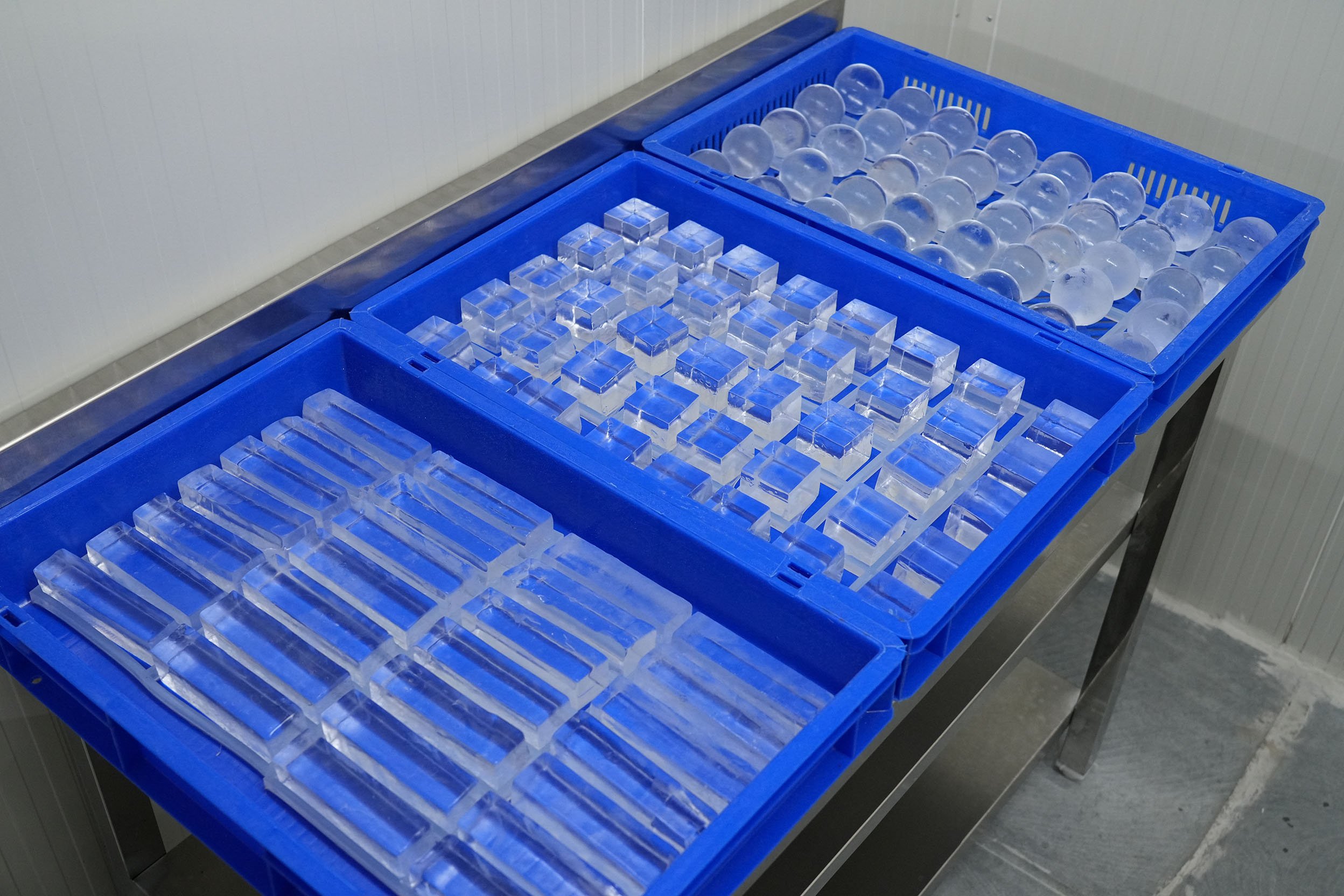 Premium clear ice produced under compliance-focused standards for hygiene and safe handling