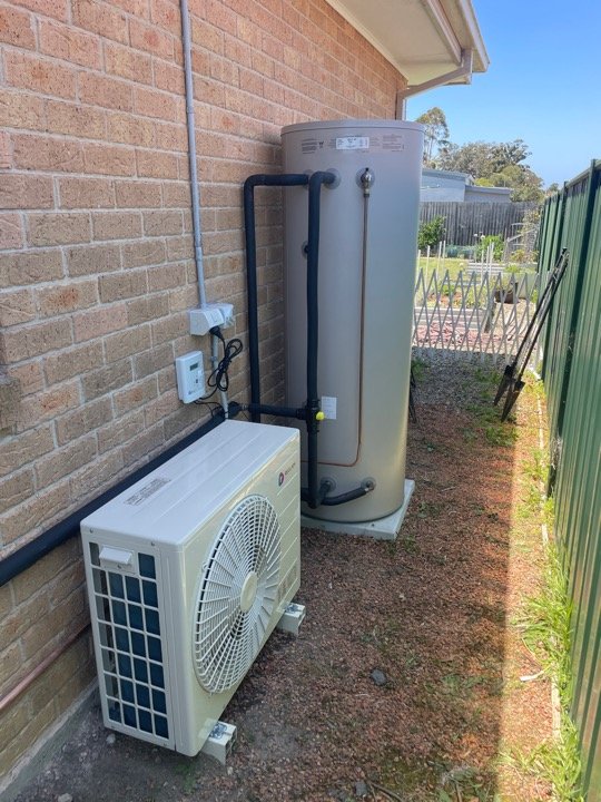Disconnection of old storage heater,
Installation of energy efficient Reclaim Heat Pump Hot water unit
