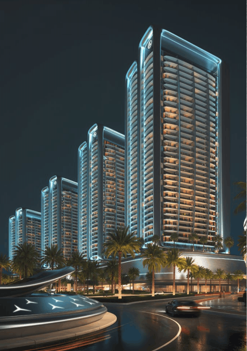 Night view of modern, high-rise buildings with blue neon lighting and curved architecture, surrounded by palm trees and a road with cars.