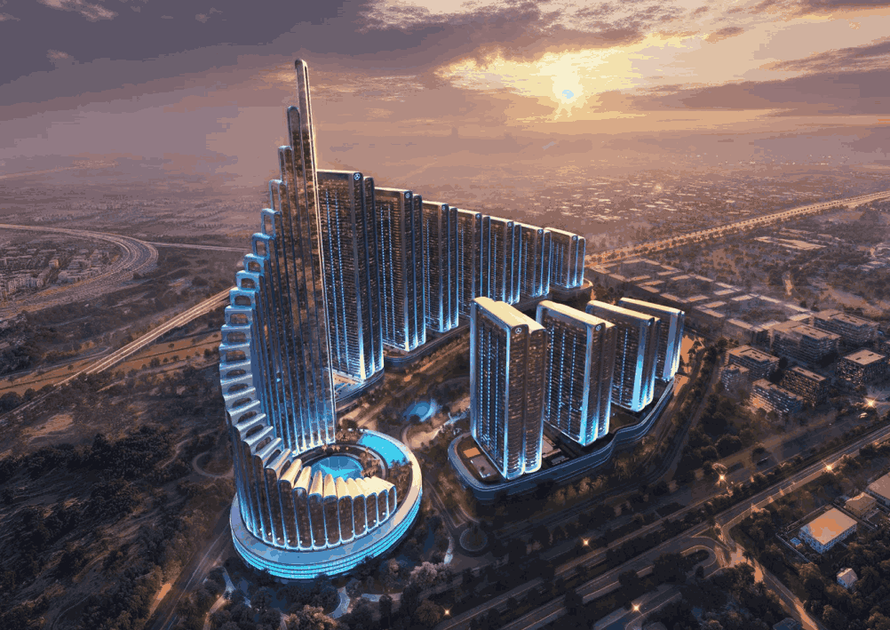 A futuristic cityscape featuring high-rise buildings illuminated with blue lights, set against a sunset sky with clouds and the sun near the horizon.