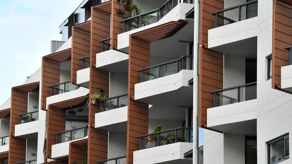 Should I buy a house or an apartment?