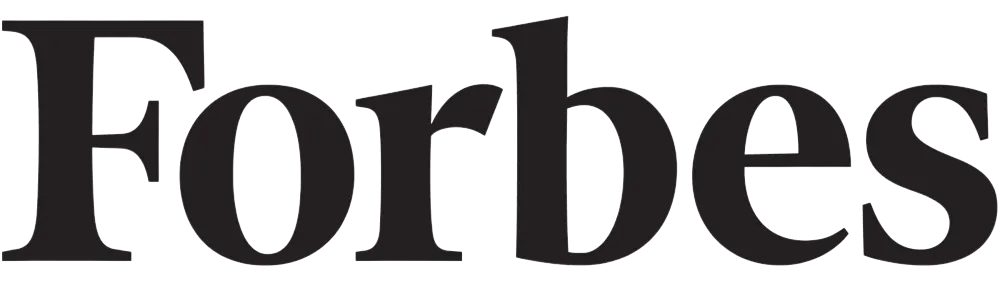 The image shows a black background with the word 'Forbes' written in large, bold, black letters.