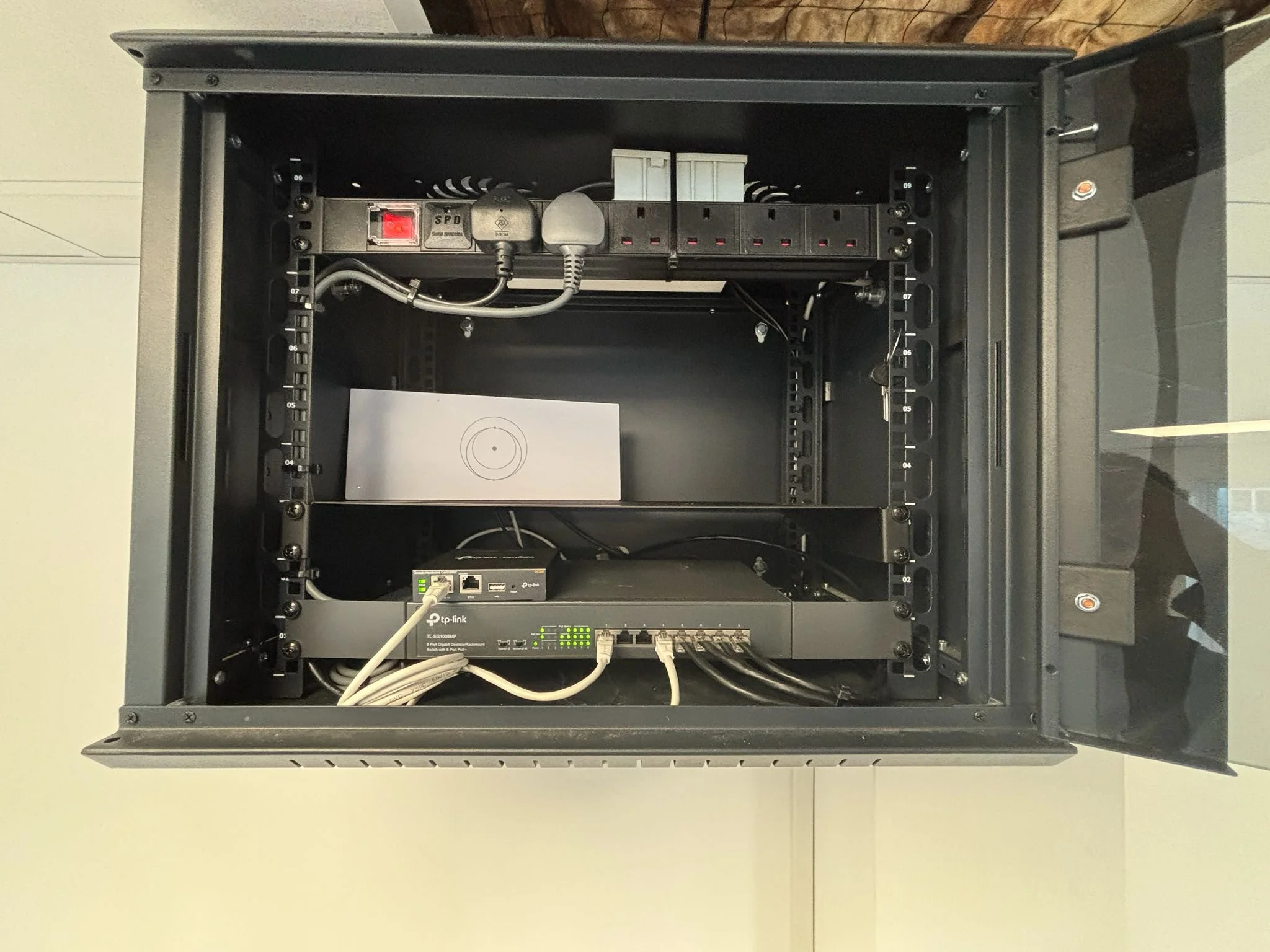 Open server rack with networking and power equipment inside