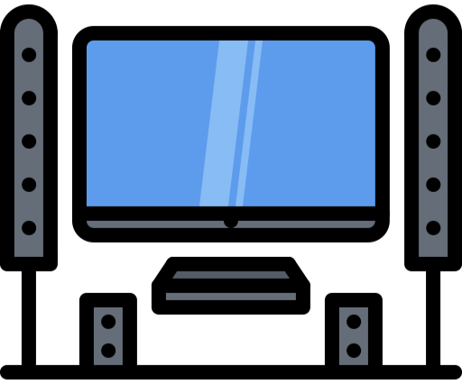 A flat-screen television with a blue screen mounted on a black wall, with four black speakers surrounding it.