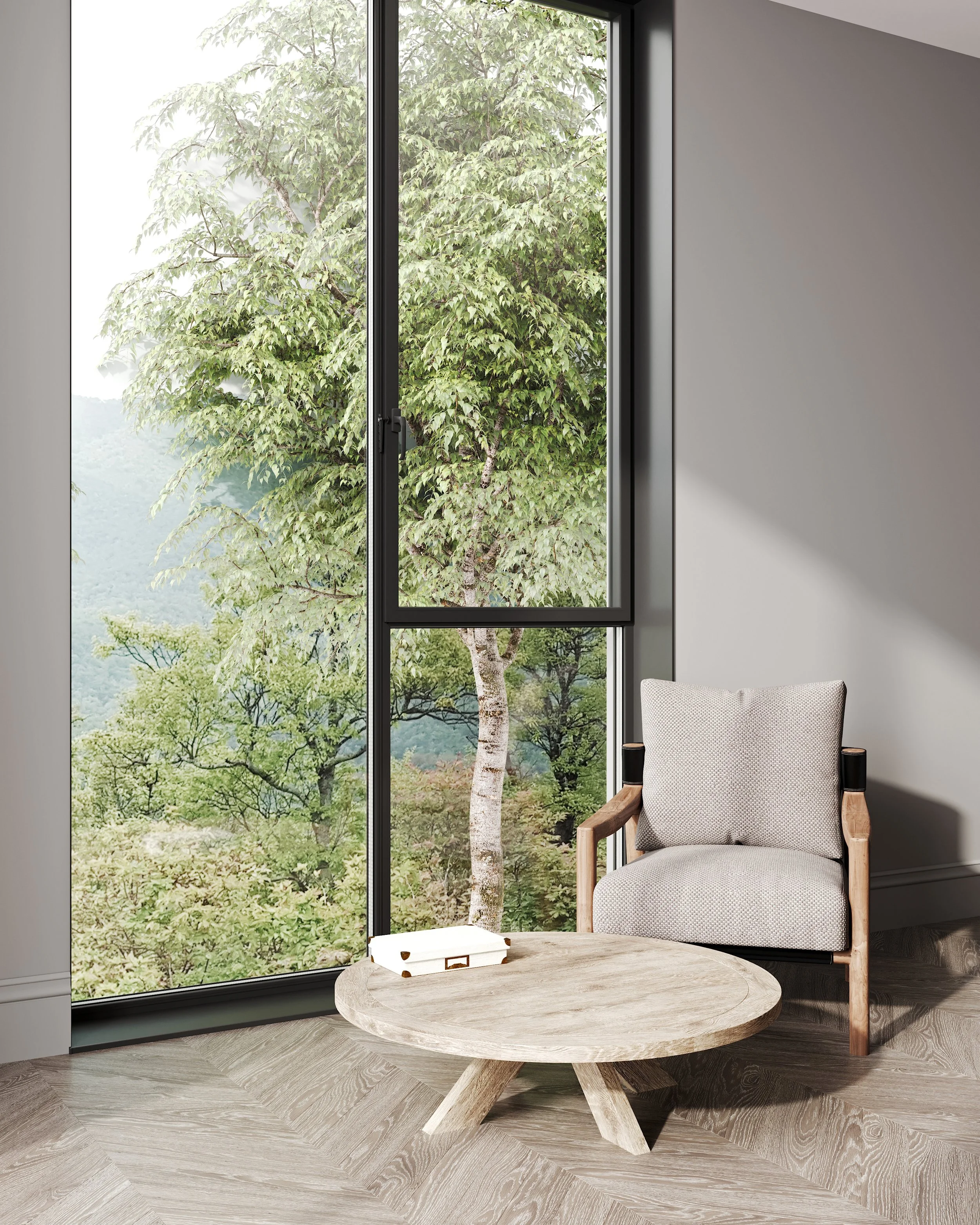 Interior of a room with a large glass window overlooking greenery, a wooden armchair with light upholstery, a round wooden coffee table, and a white box on the table.