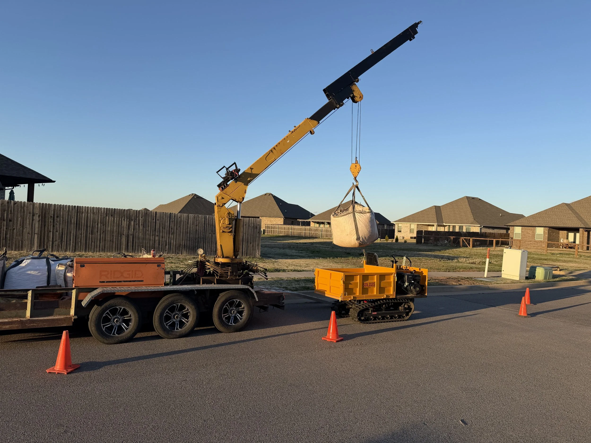 Delivered gravel the only way to get there was on the Greenbelt behind the house.