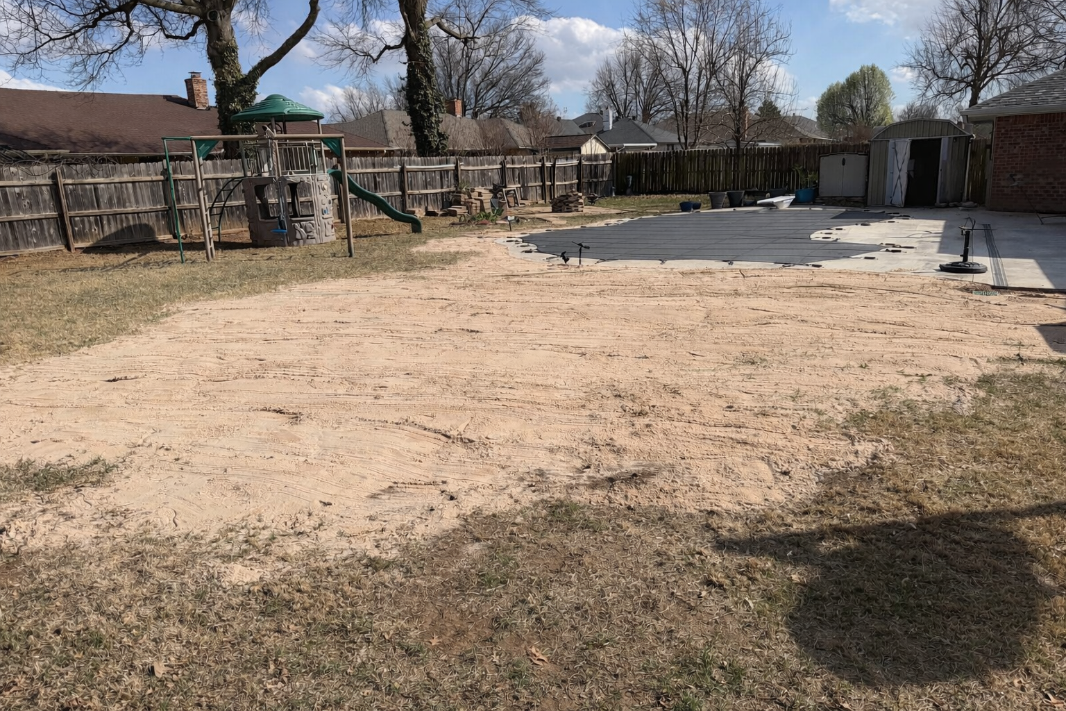 6,000 lbs of mason sand was used to level the yard around the pool