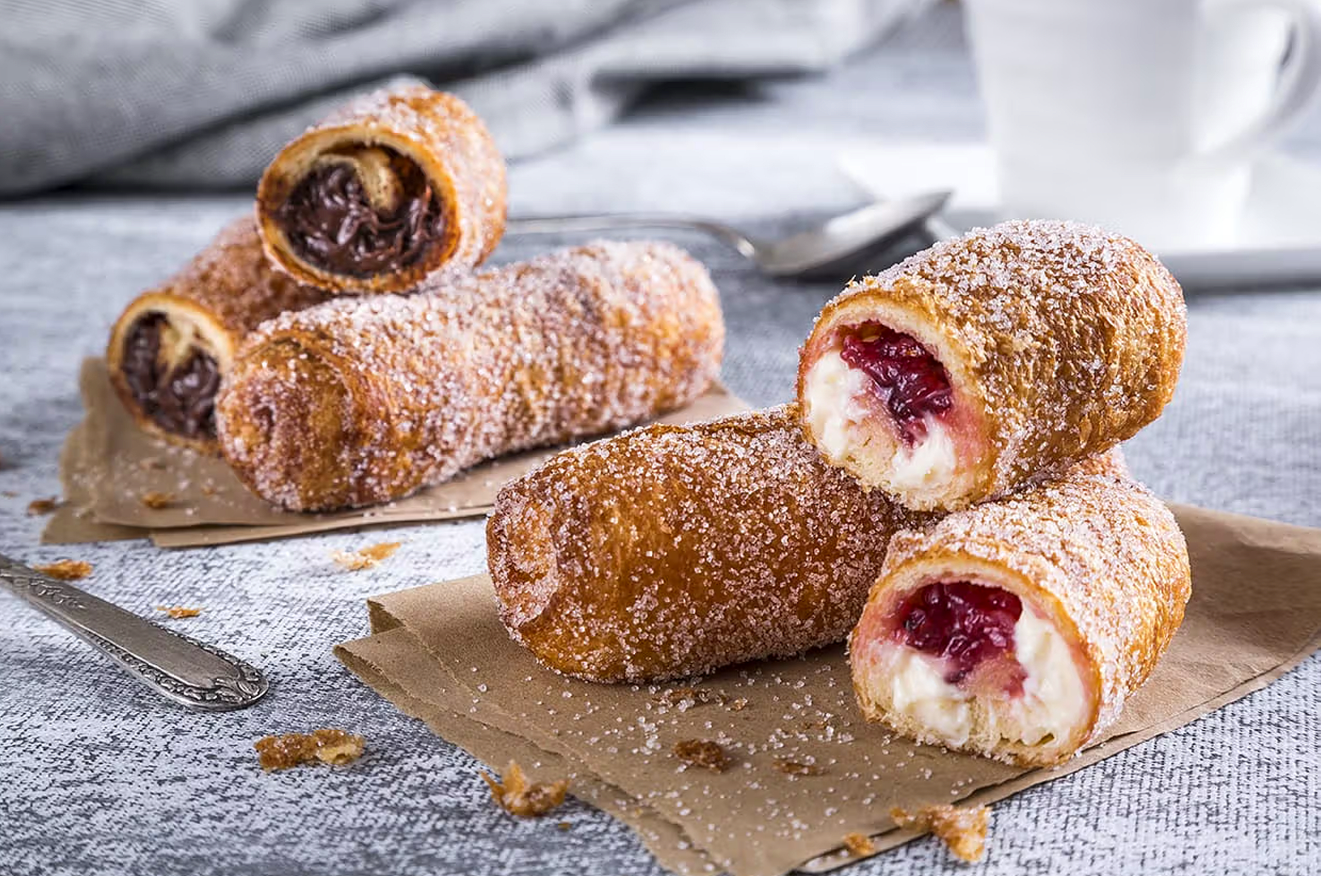 Xuixos with JonCake cheesecake filling in front, and chocolate in back.