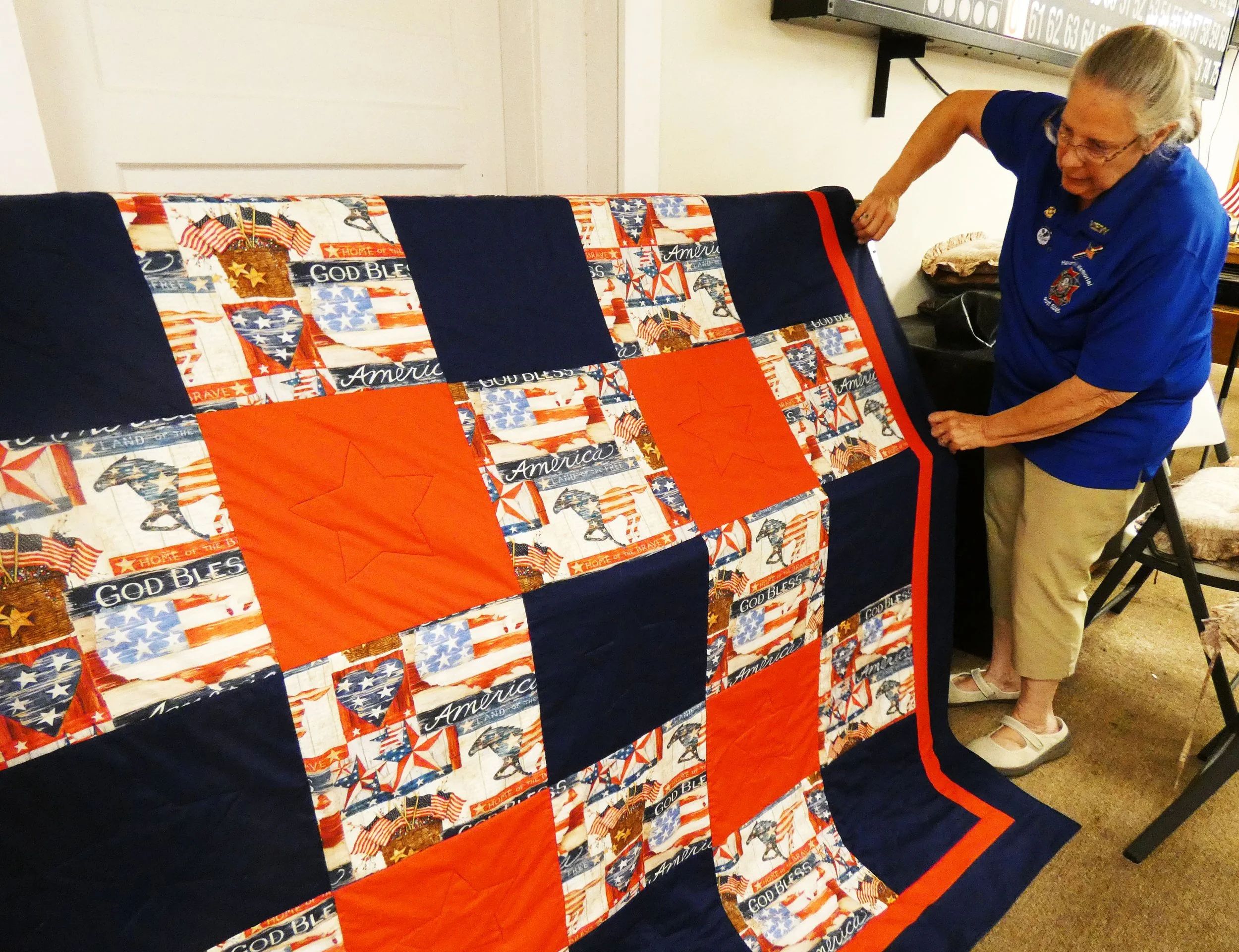 Cherished Quilt of Valor presented to WW2 veteran Earl Aremburg