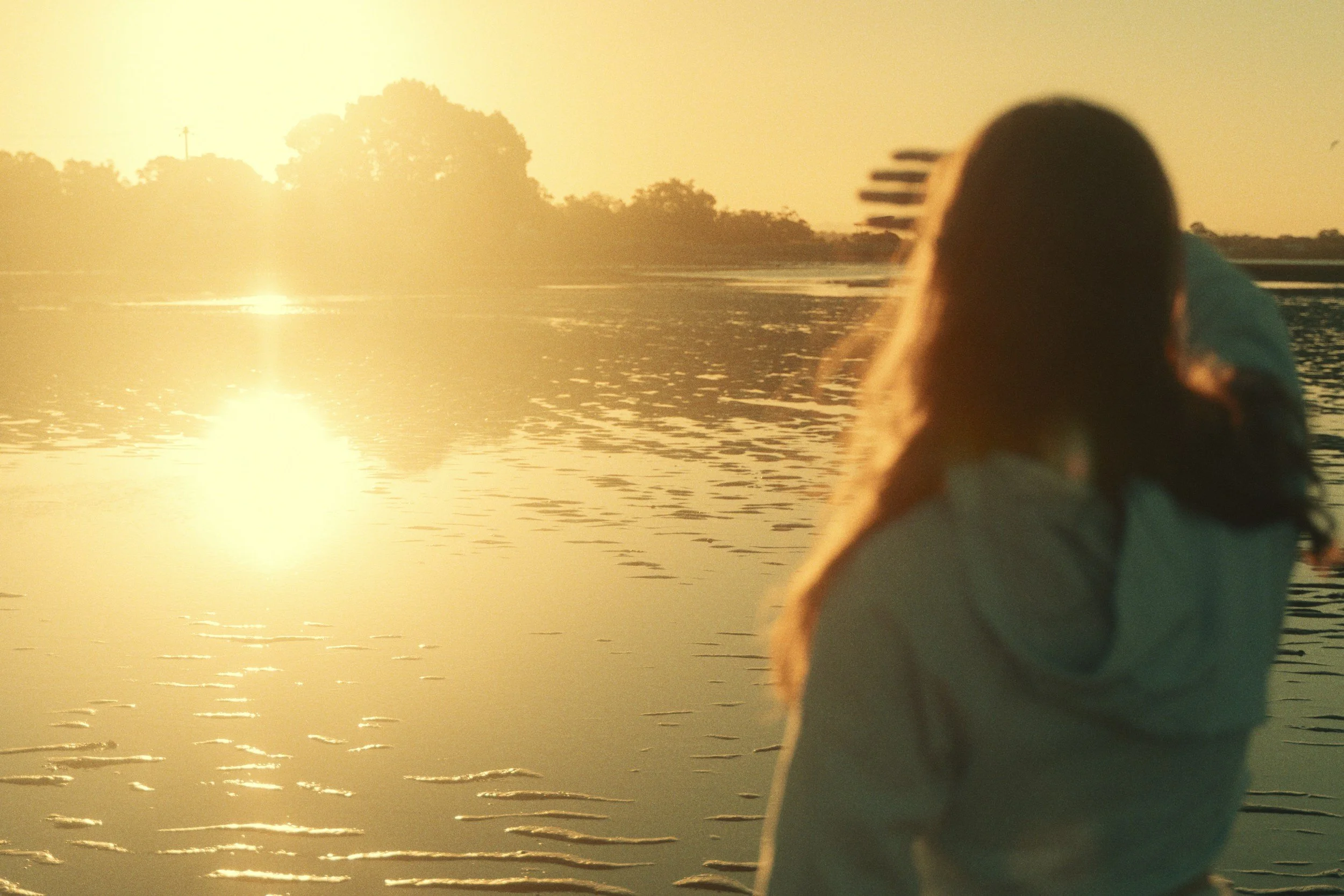 Hairstylist embodying confidence and balance while learning to protect her energy behind the chair