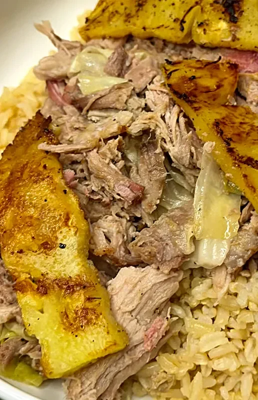 Kalua pork with grilled pineapple over rice