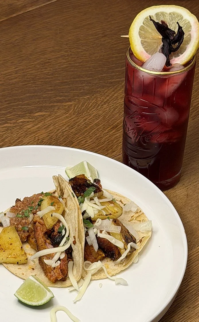 Tacos al pastor with fresh hibiscus cocktail