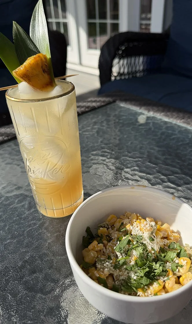 Fresh street corn salad with pineapple cocktail