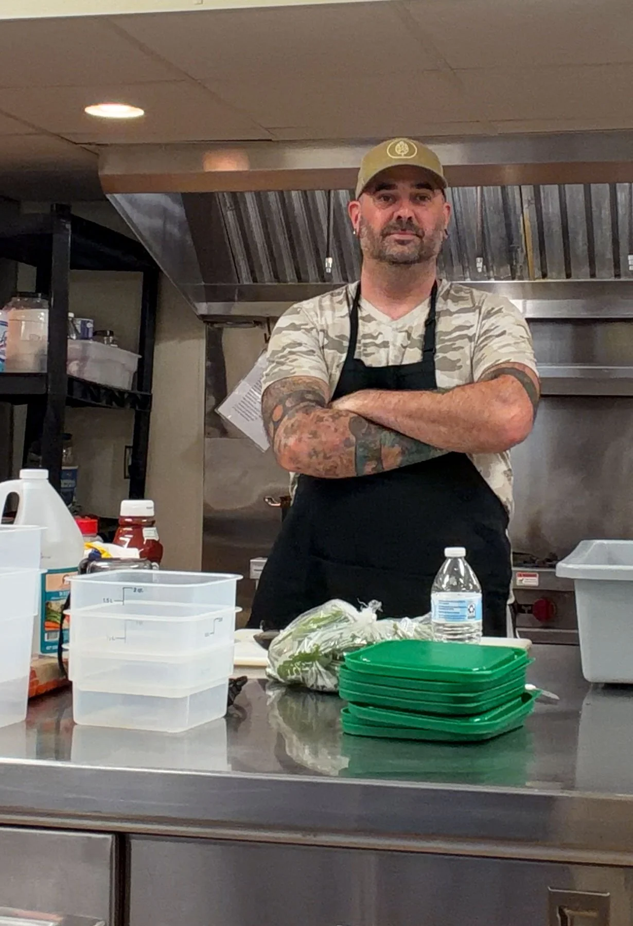 Krispin Dolbear working in the kitchen