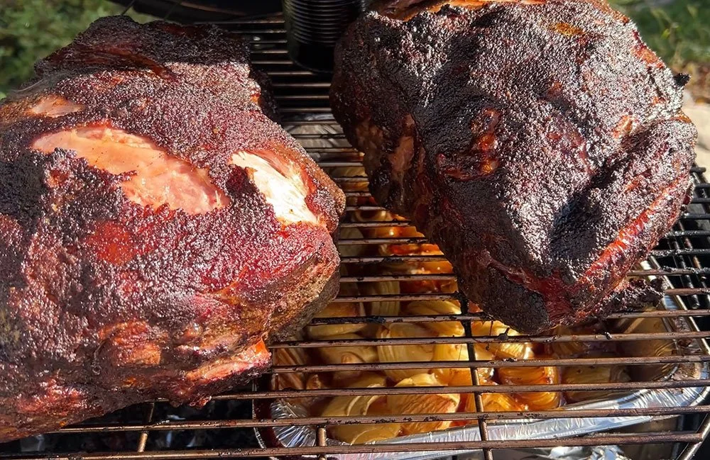 Pork butts and onions in the smoker