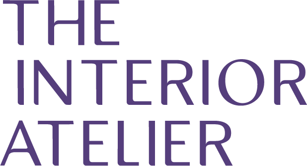 Text reading 'THE INTERIOR ATELIER' in purple against a black background.