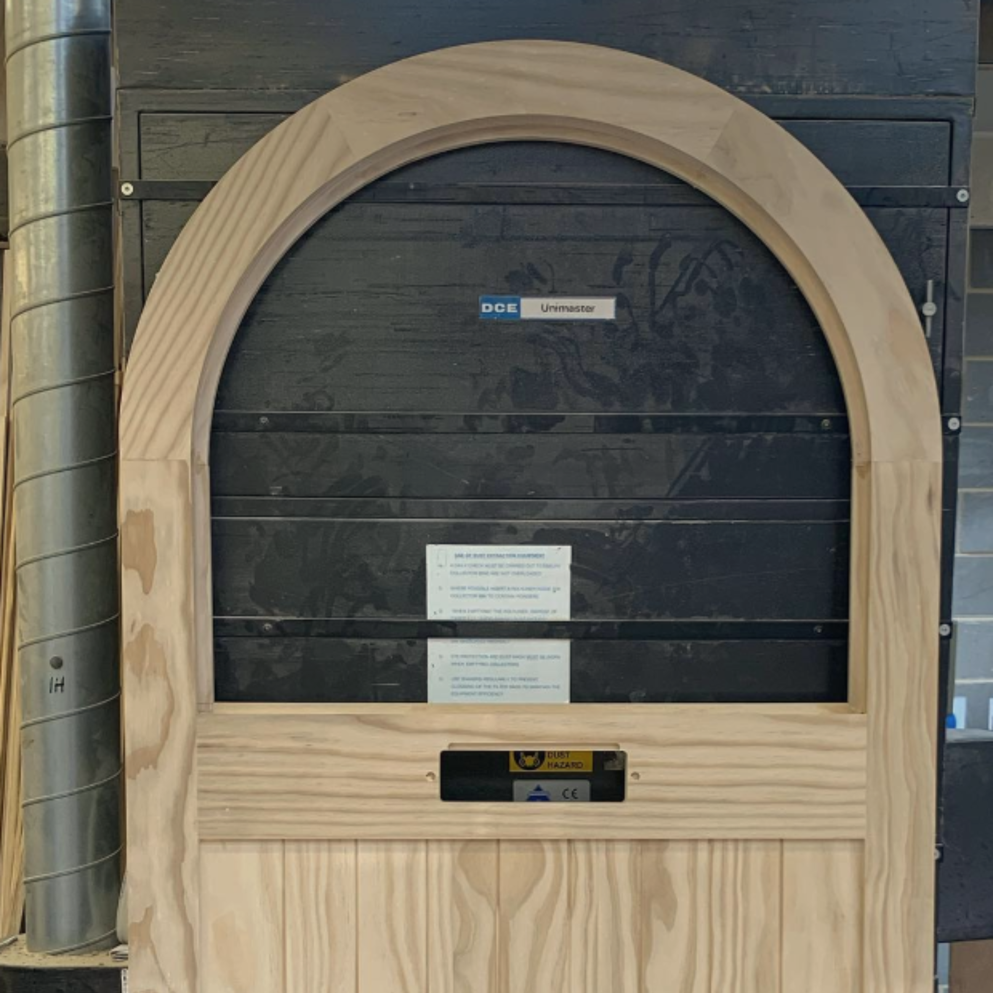 Wooden arch-shaped accoya door.