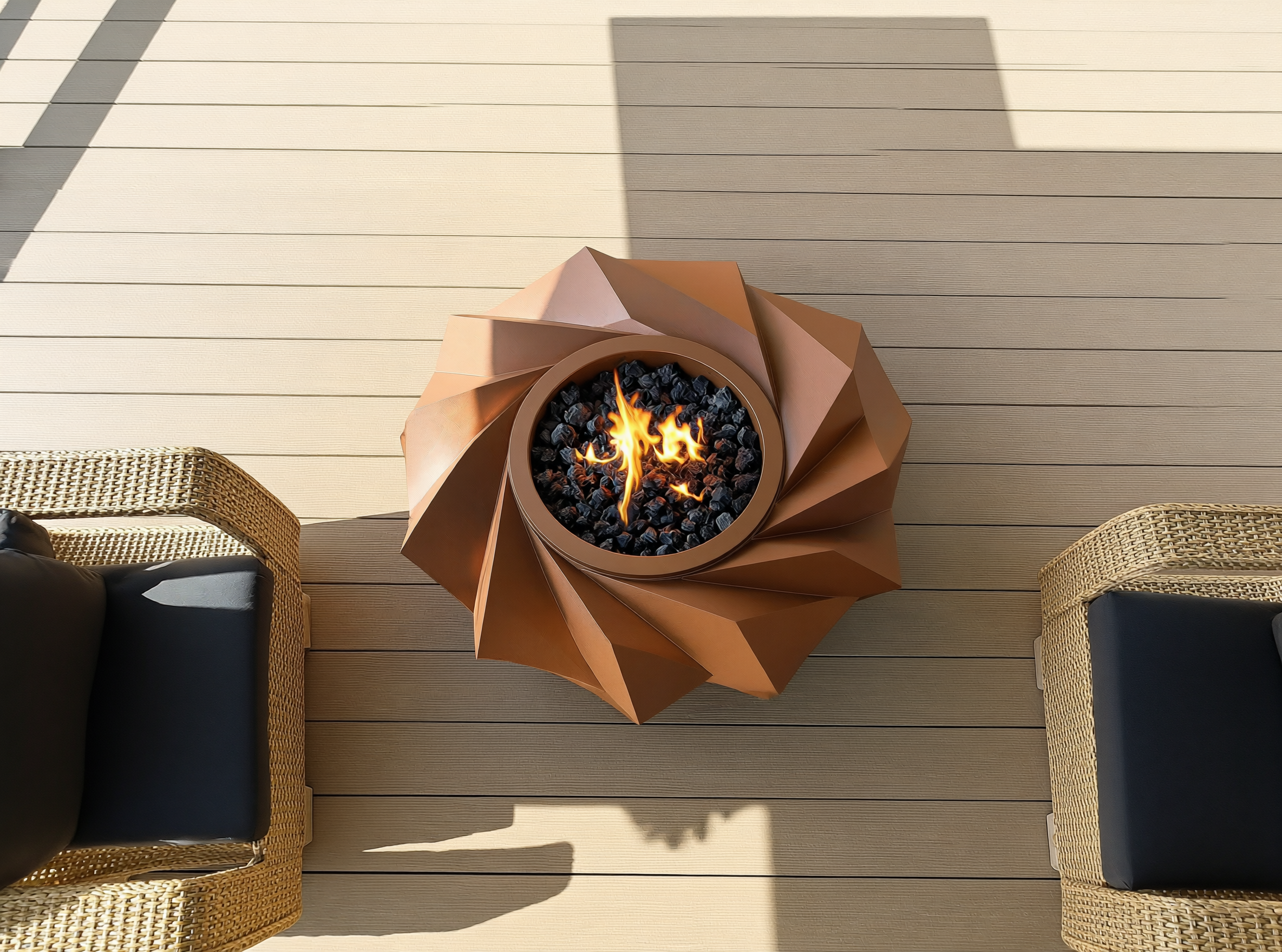 Outdoor patio scene with a modern fire pit table at the center, surrounded by wicker chairs on a wooden deck.
