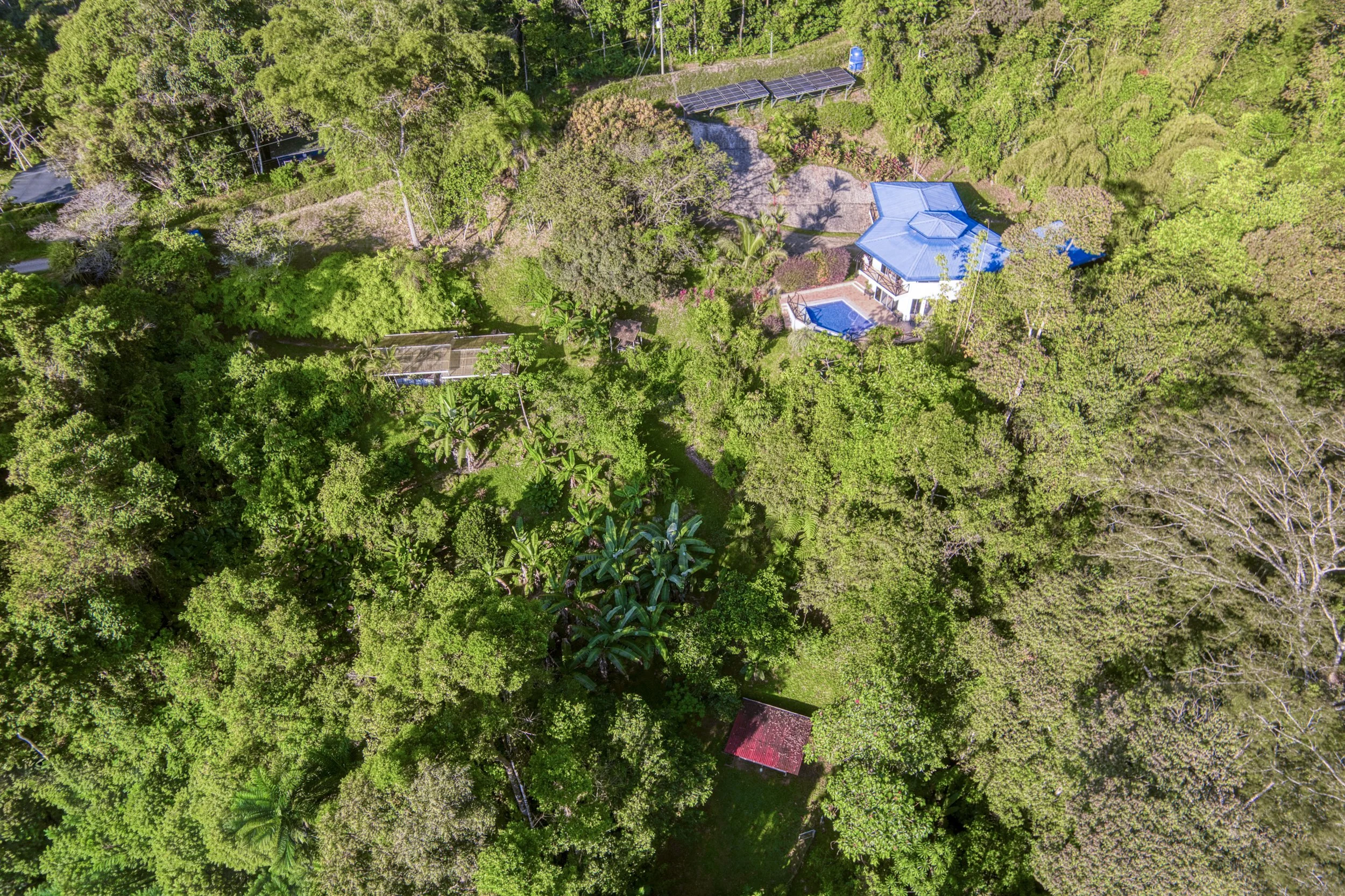 Aerial overview of Casa Arbol de Vida and both titled lots in the hills of Platanillo de Baru above Dominical.