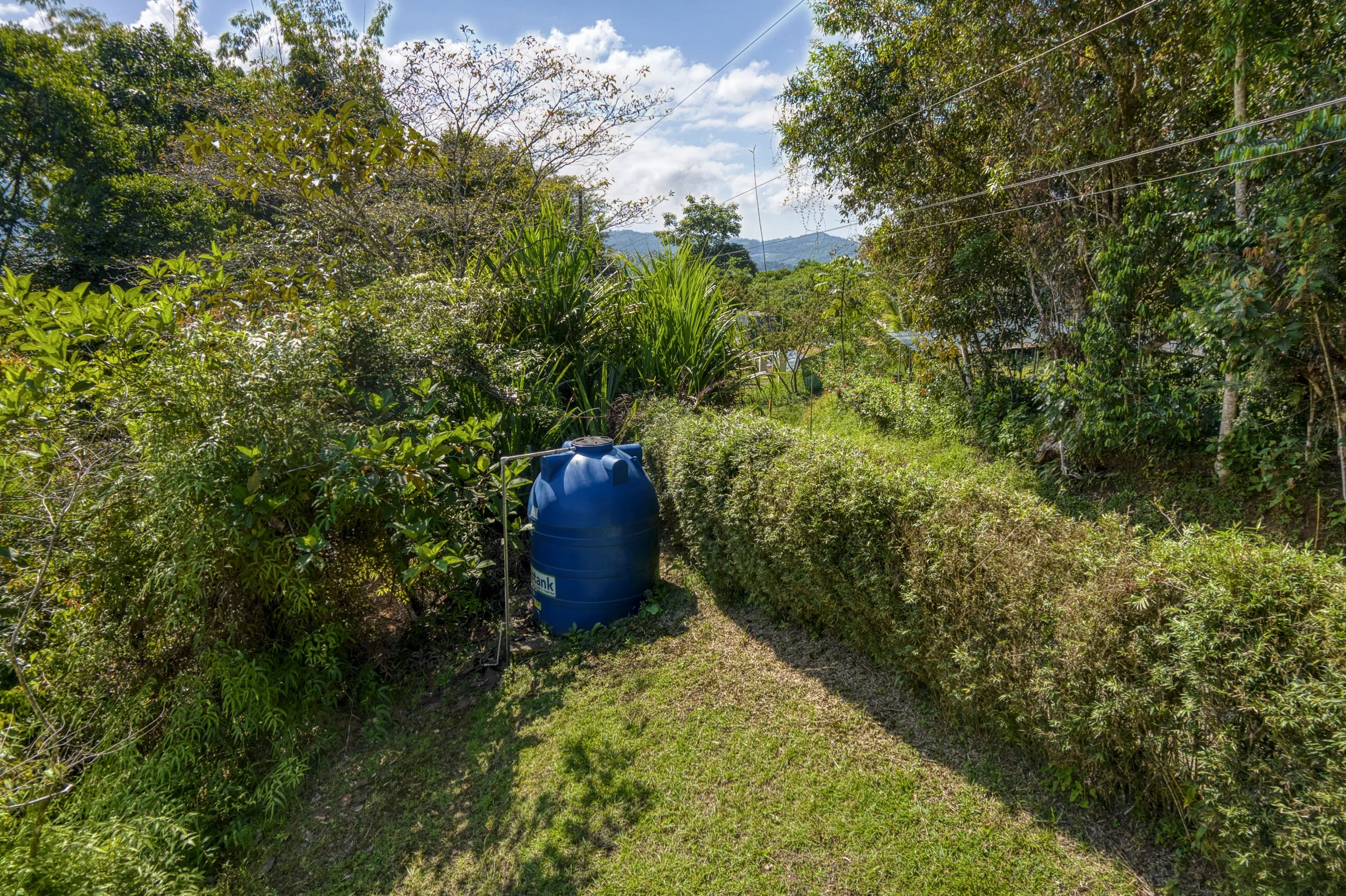 5,000-liter water storage system supporting reliable irrigation water supply for gardening.
