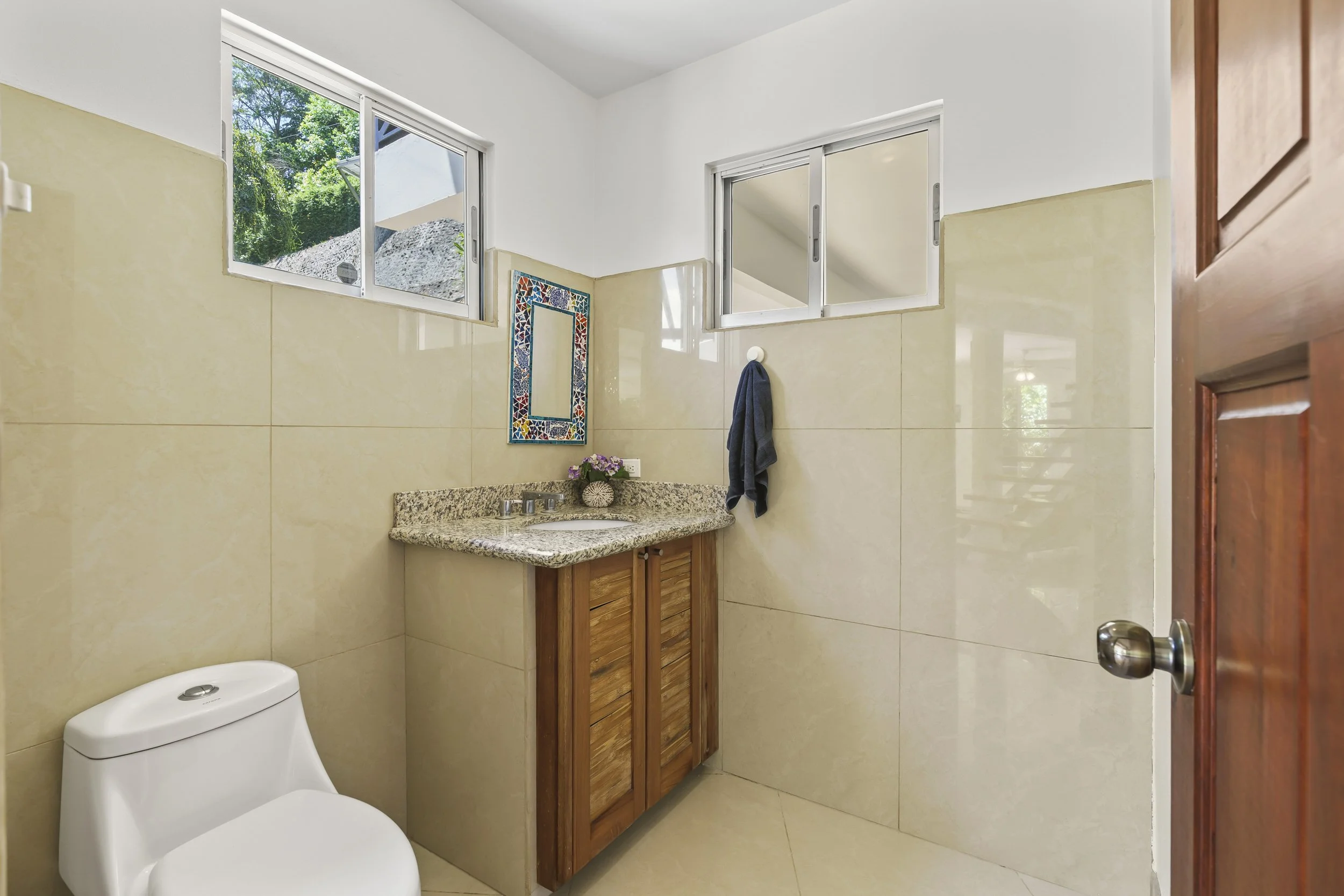 Half bathroom located on the main floor for convenience and accessibility.