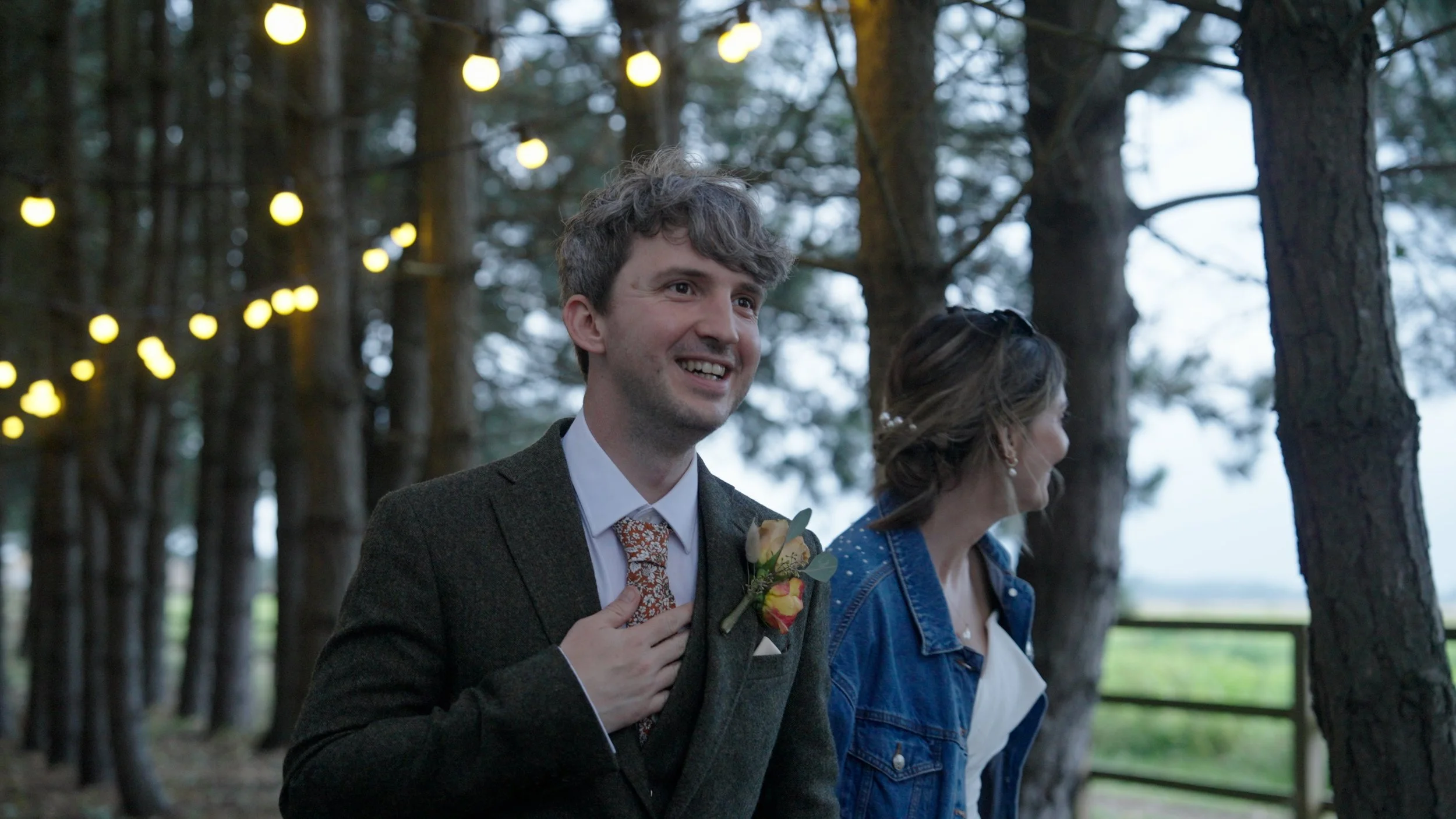 Laurie’s customers, Evan and Kade, running down a mountain after getting married. 