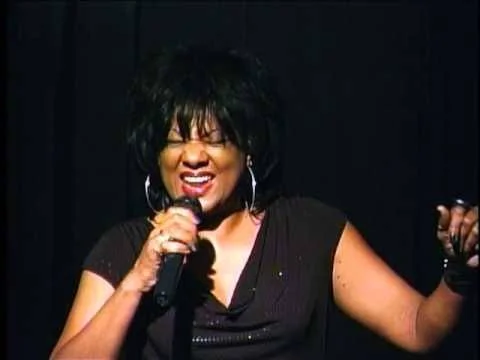 Toni singing live.