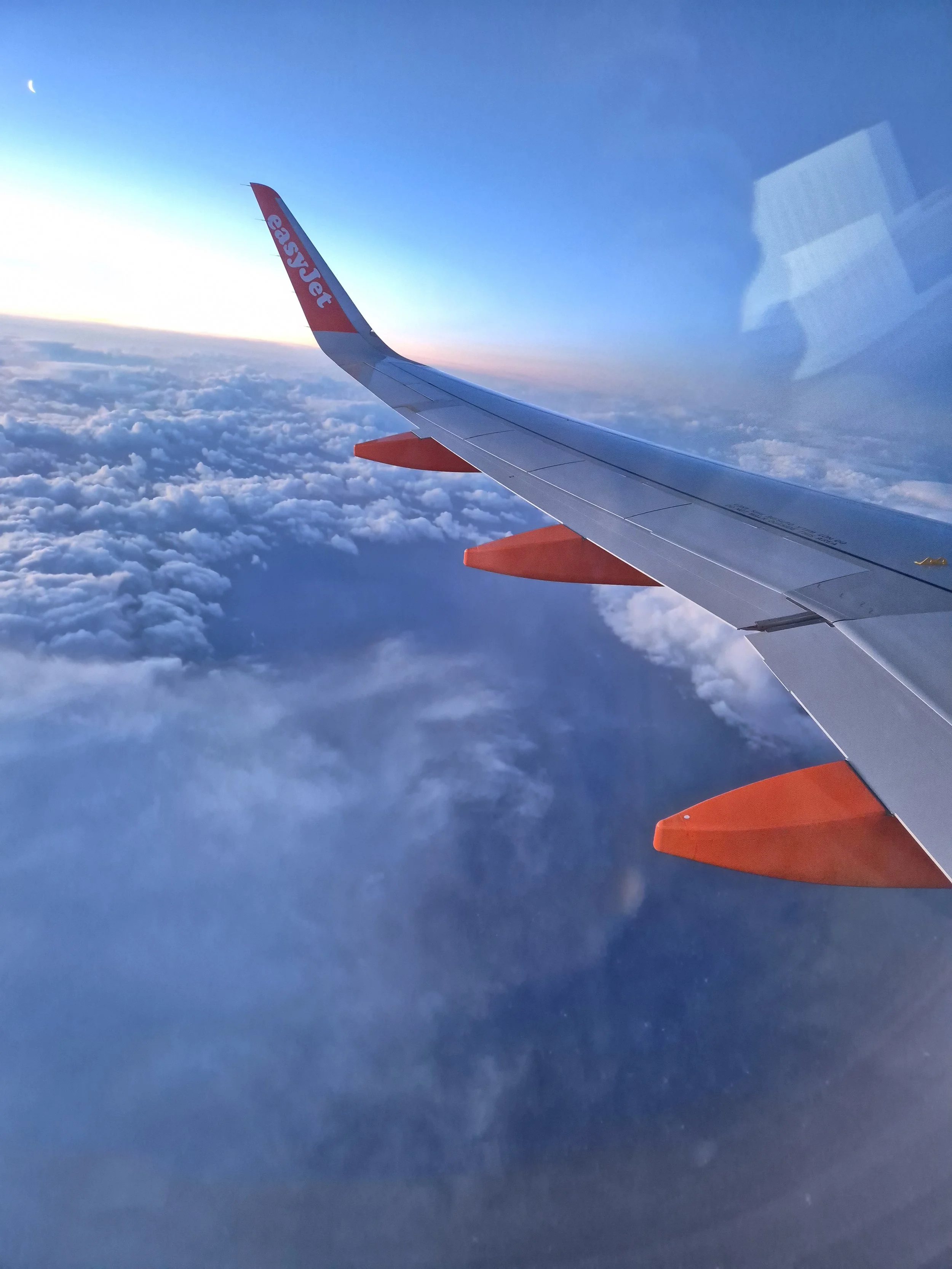 How I Survived a 16-Hour Flight to Thailand Solo with Two Kids