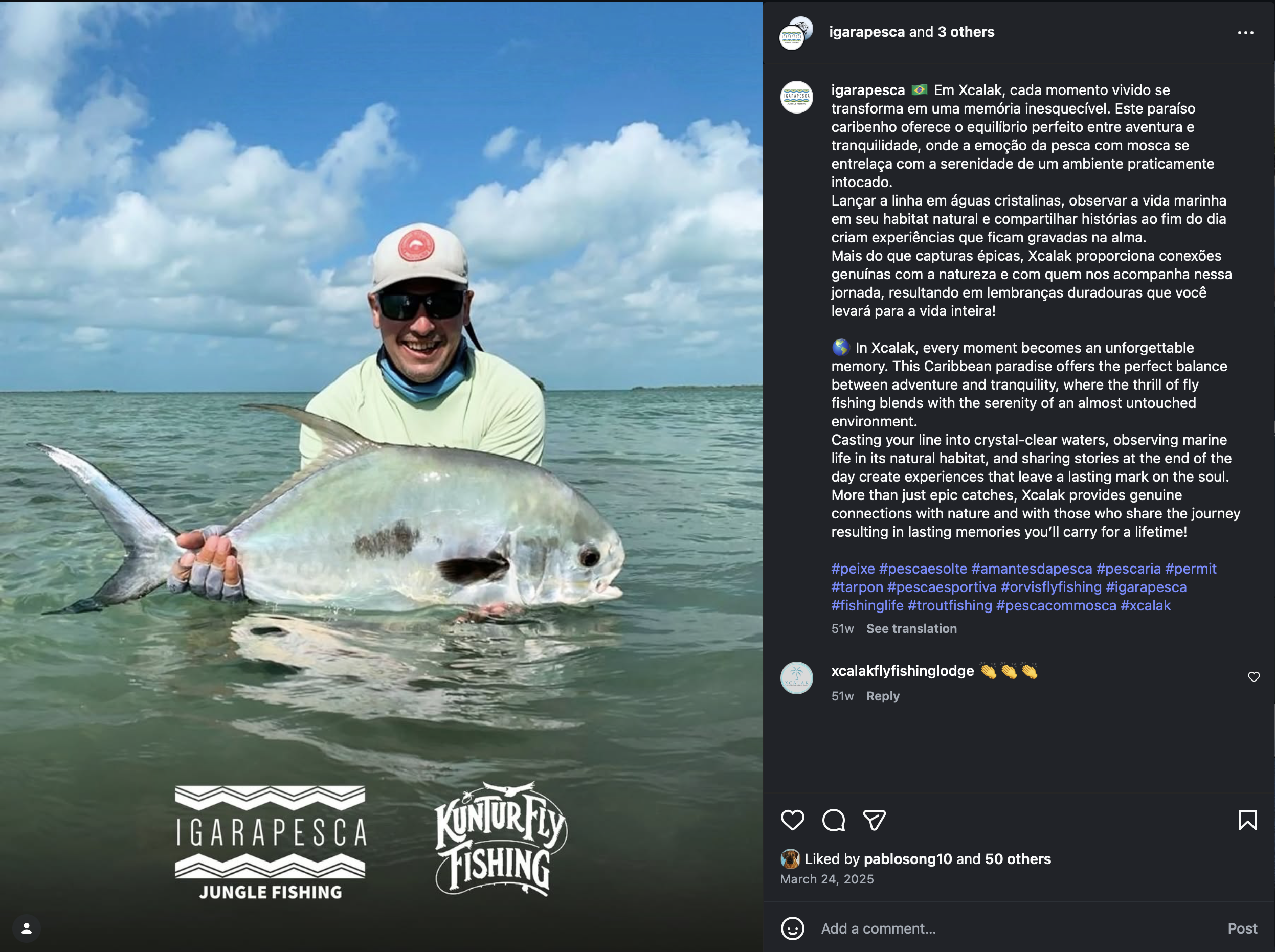 Man wearing a white cap, sunglasses, and a light-colored shirt holding a large fish in shallow clear water with a bright blue sky and white clouds in the background.