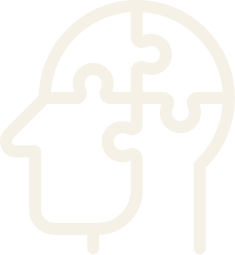 Outline of a human head with puzzle pieces inside
